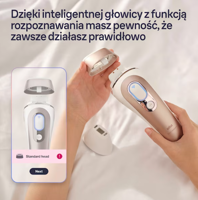 Dłoń trzyma depilator Braun z odłączaną głowicą.