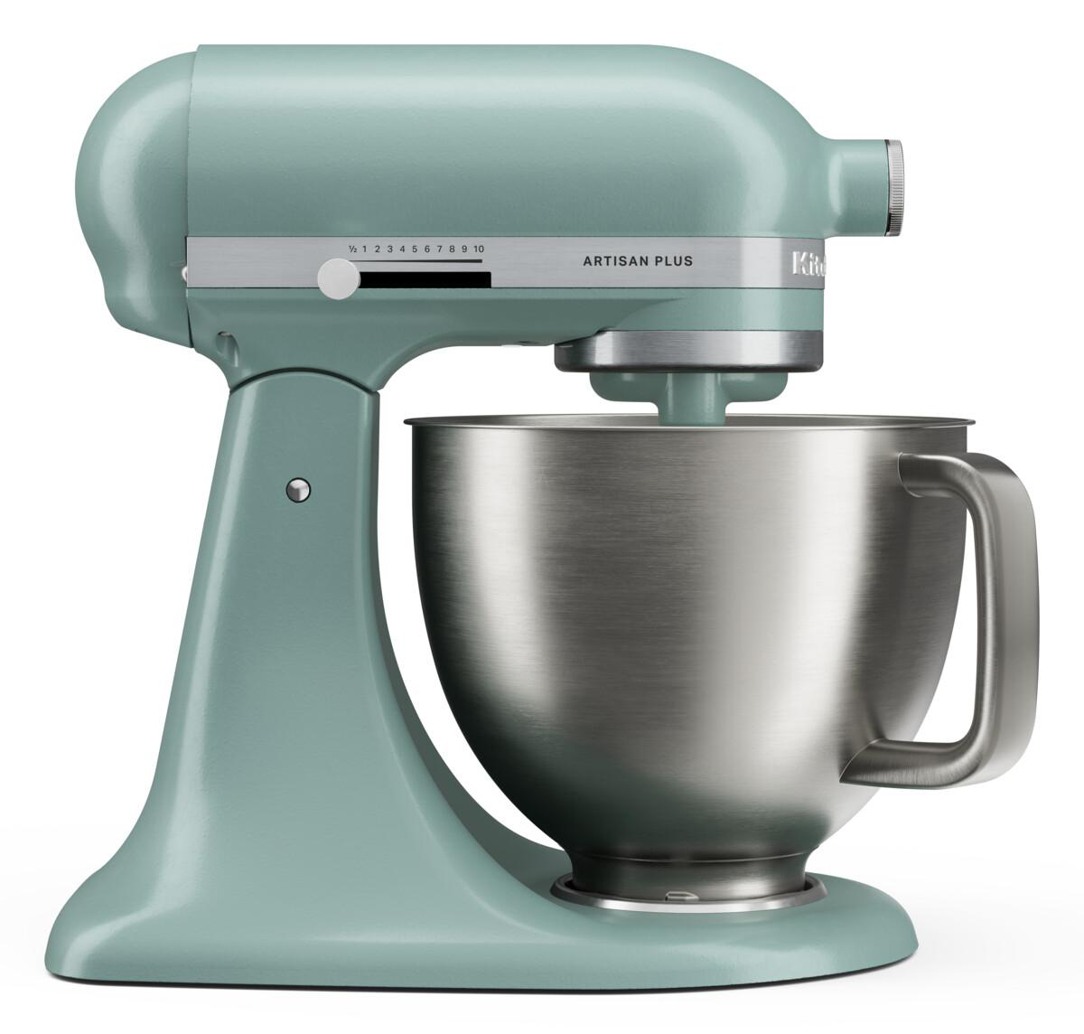 Ein hellgrüner Küchenmixer mit Edelstahlschüssel, weißem Regler und schwarzer Skala.
