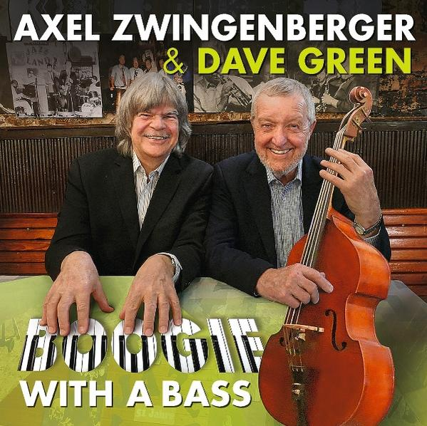 Zwei Männer posieren vor einem Kontrabass. Text liest „Boogie With A Bass“.