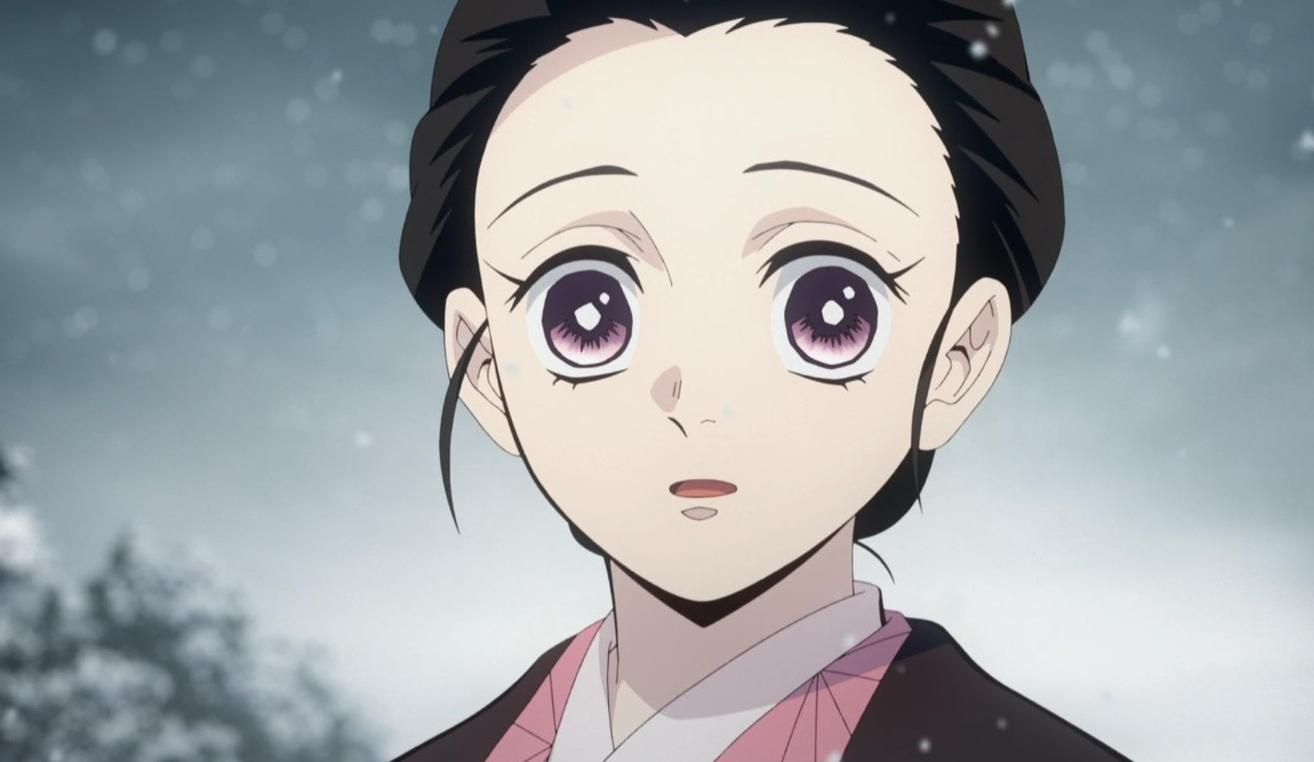 Anime-Mädchen mit großen Augen und dunklem Haar, das im Schnee steht.
