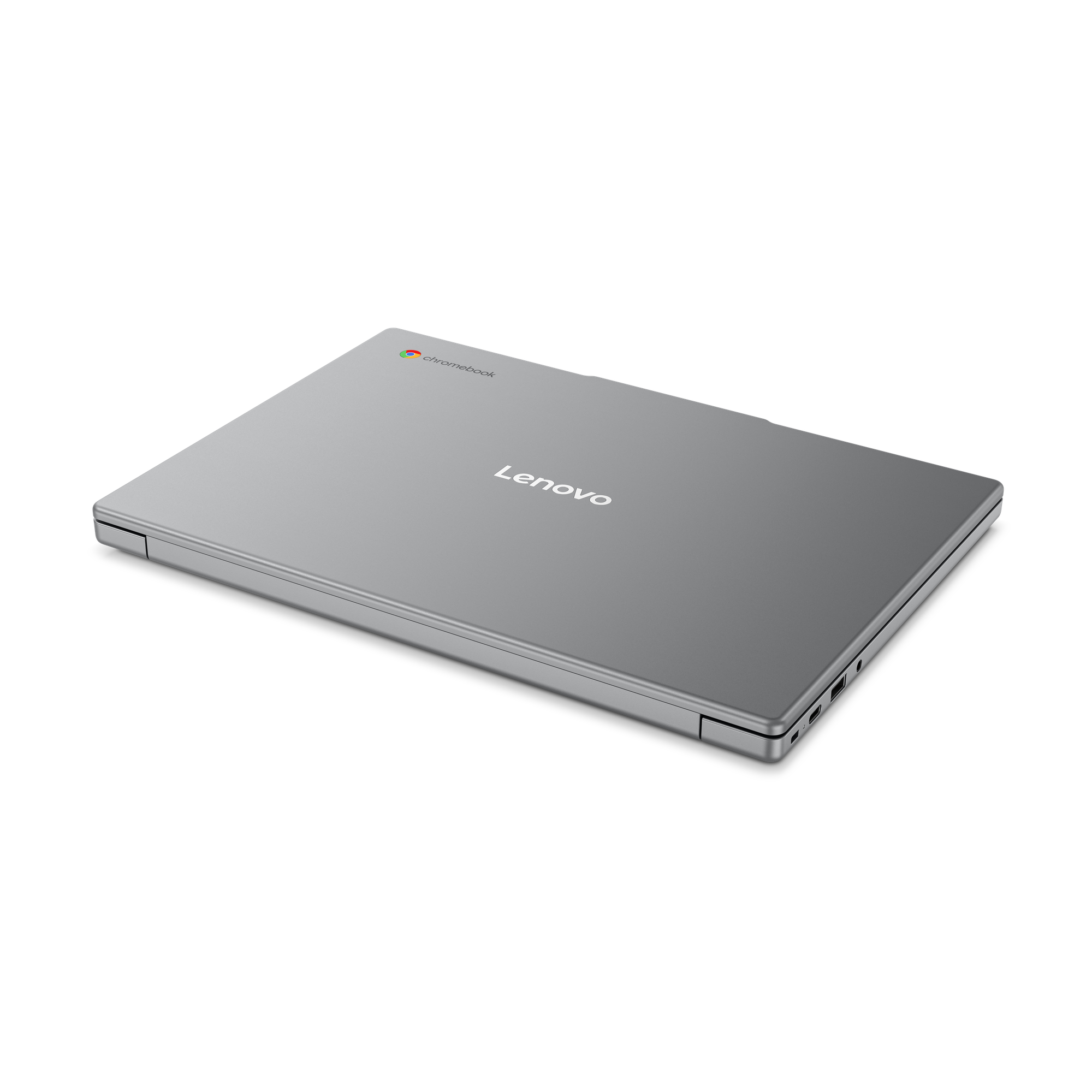 Ein geschlossenes silbernes Lenovo Chromebook auf schwarzem Hintergrund.