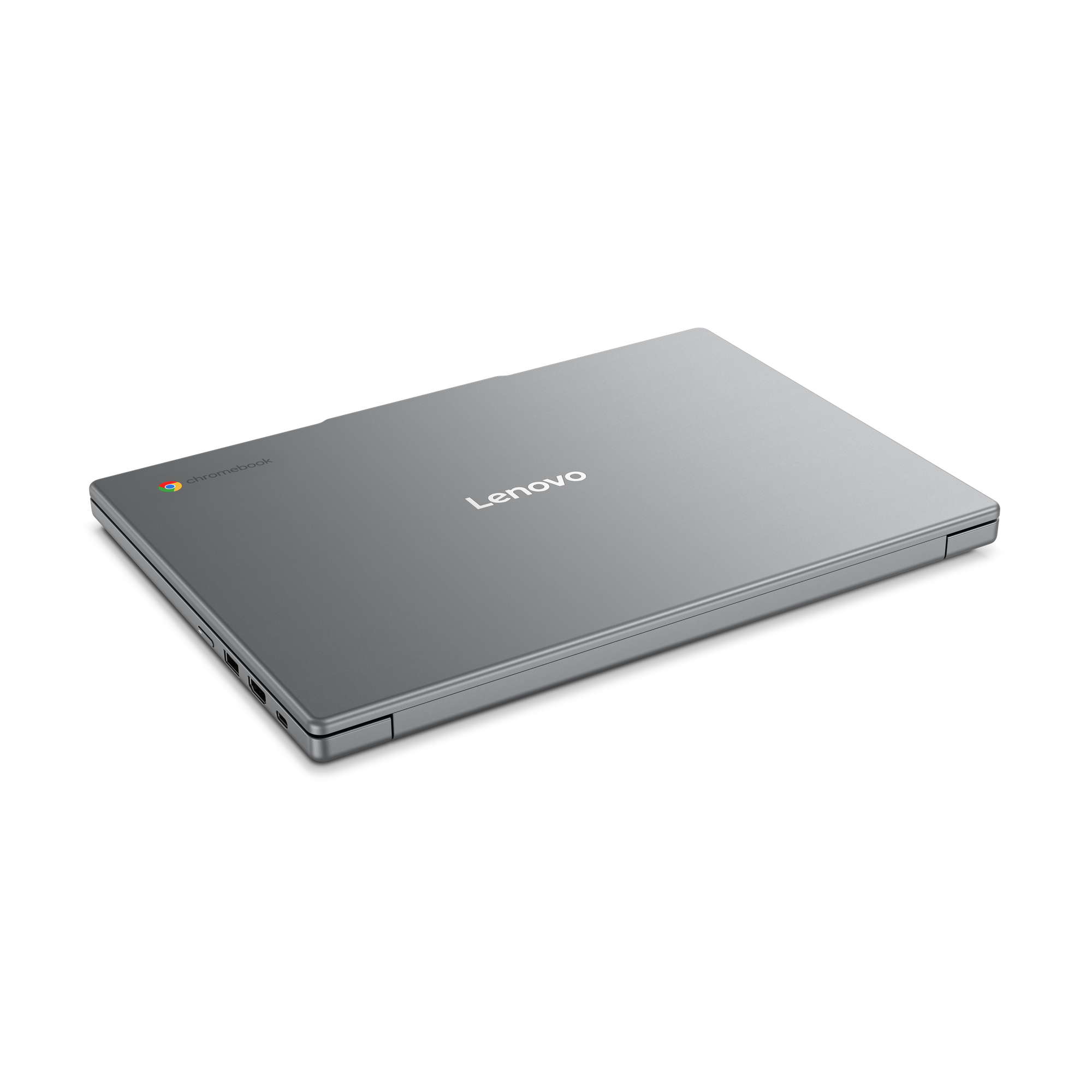 Ein geschlossener, silberner Lenovo Chromebook Laptop auf schwarzem Hintergrund.