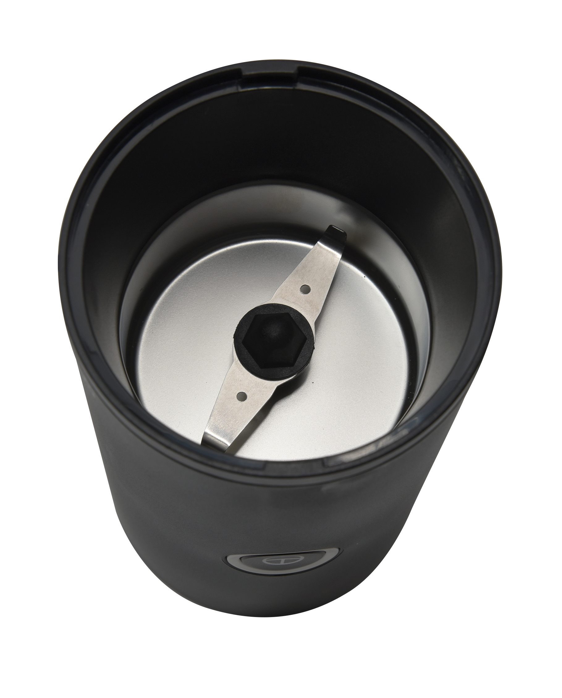 Wnętrze elektrycznego młynka do kawy z ostrymi metalowymi ostrzami.