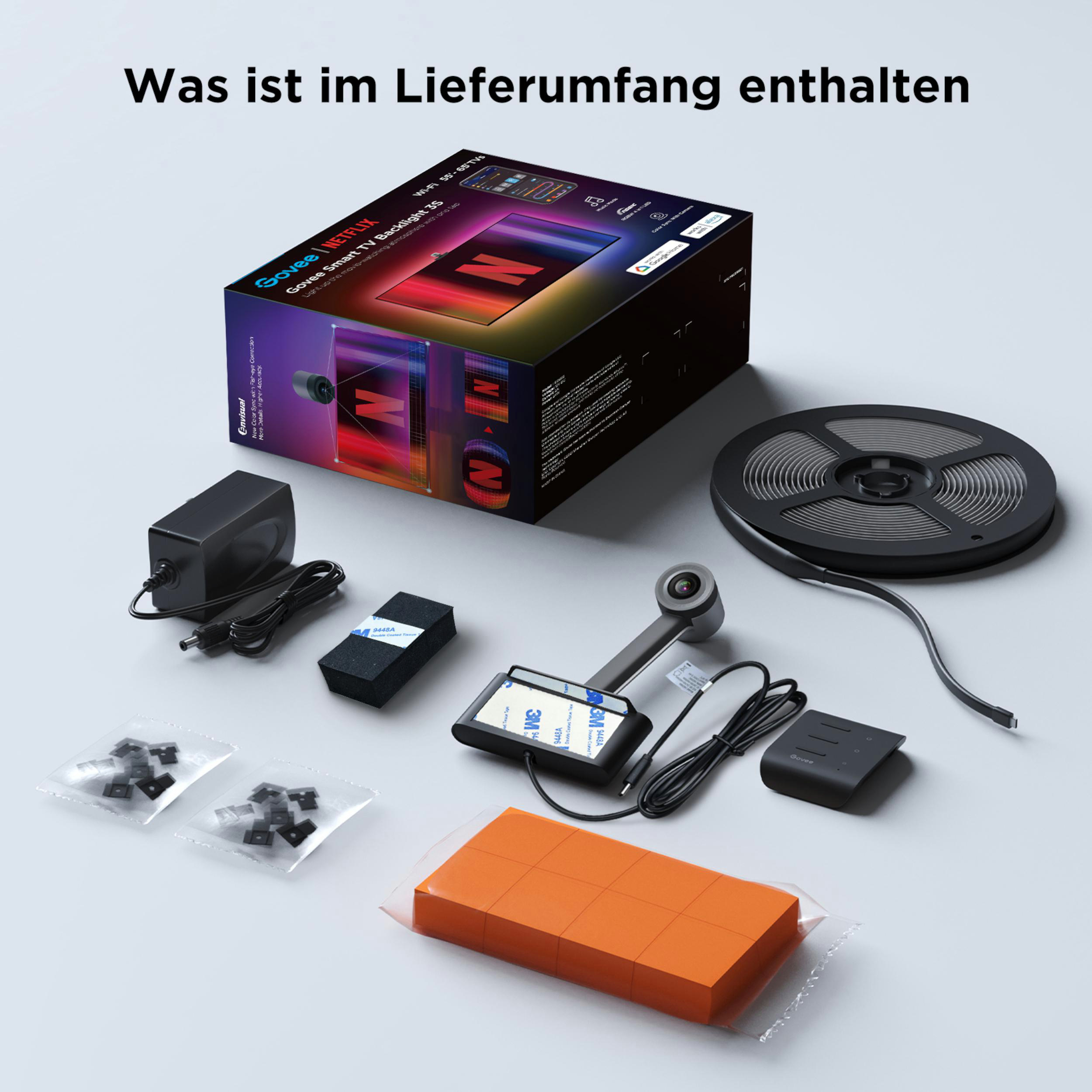 Ein Netzteil, Kamera, Lichtstreifen und Kleinteile für einen Govee TV-Hintergrundbeleuchtung.