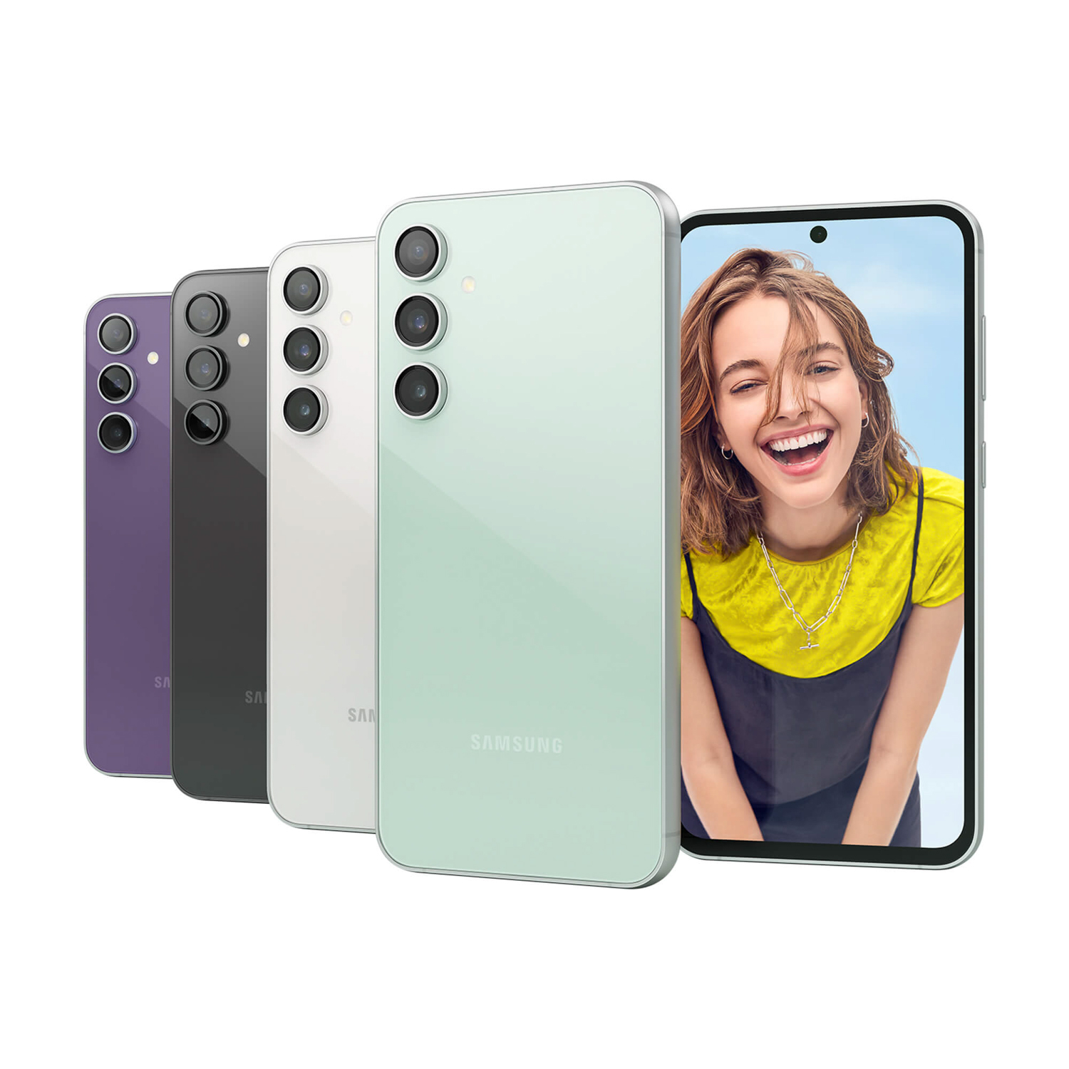 Quattro telefoni Samsung viola, nero, bianco e verde. Lo schermo mostra una donna felice.