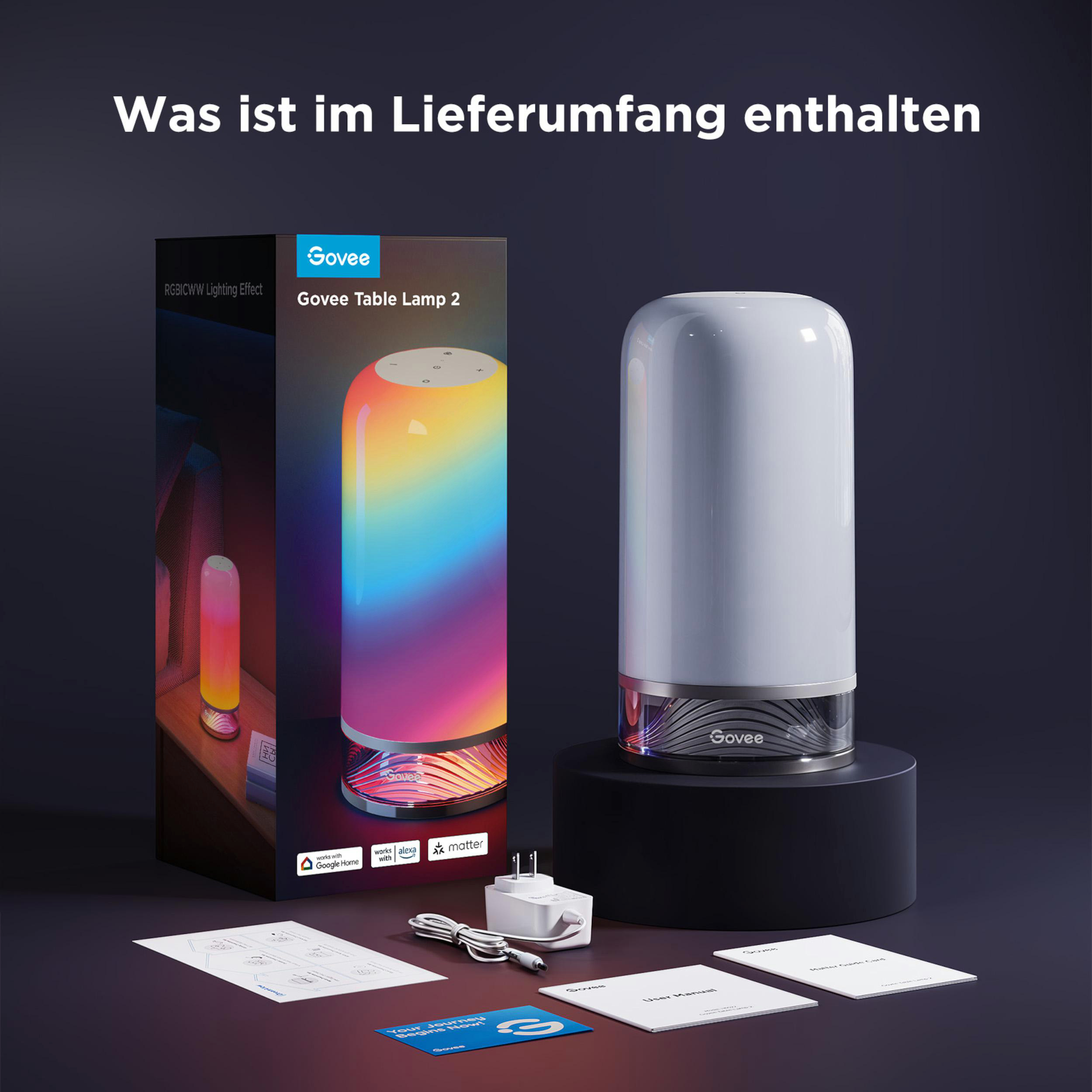 Govee Tischlampe 2, Netzteil, Kabel und Anleitungen auf dunklem Hintergrund.