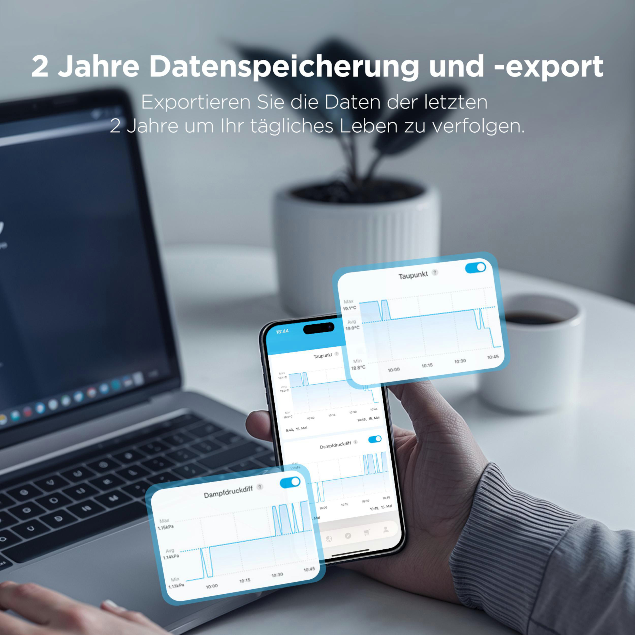 Eine Hand hält ein Smartphone, das Daten aus 2 Jahren anzeigt. Daneben ein Laptop.
