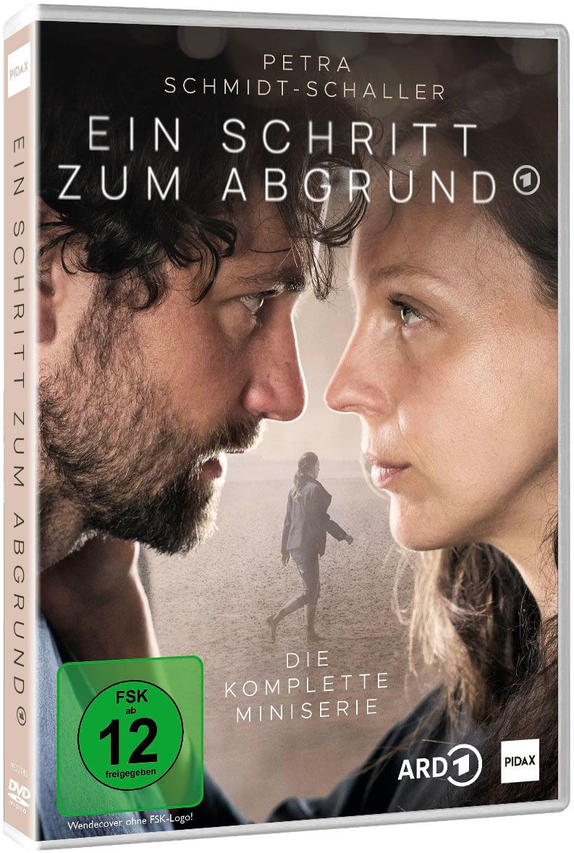 DVD-Cover: Nahaufnahme zweier Gesichter, im Hintergrund eine Frau.