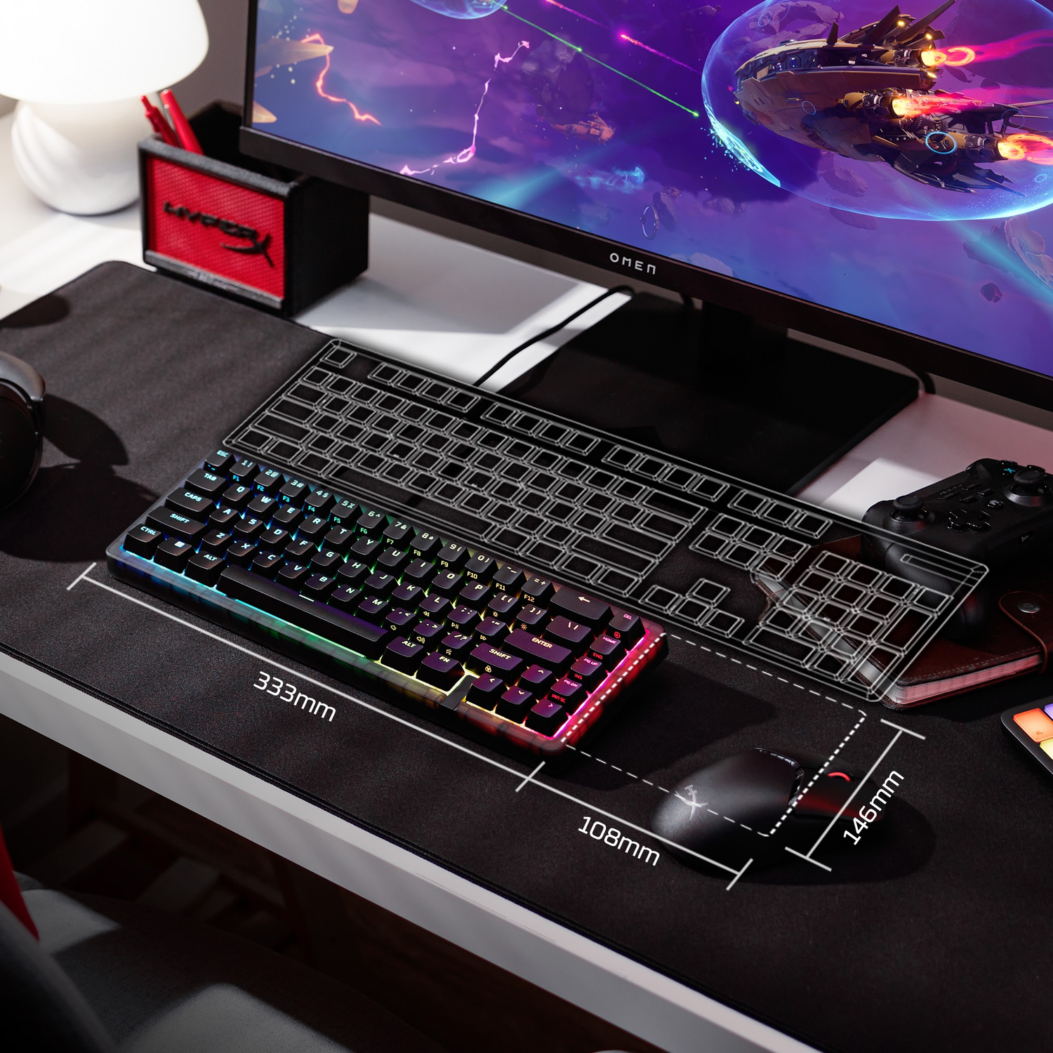 A gaming setup with keyboard, mouse, and monitor. The keyboard has RGB lighting.