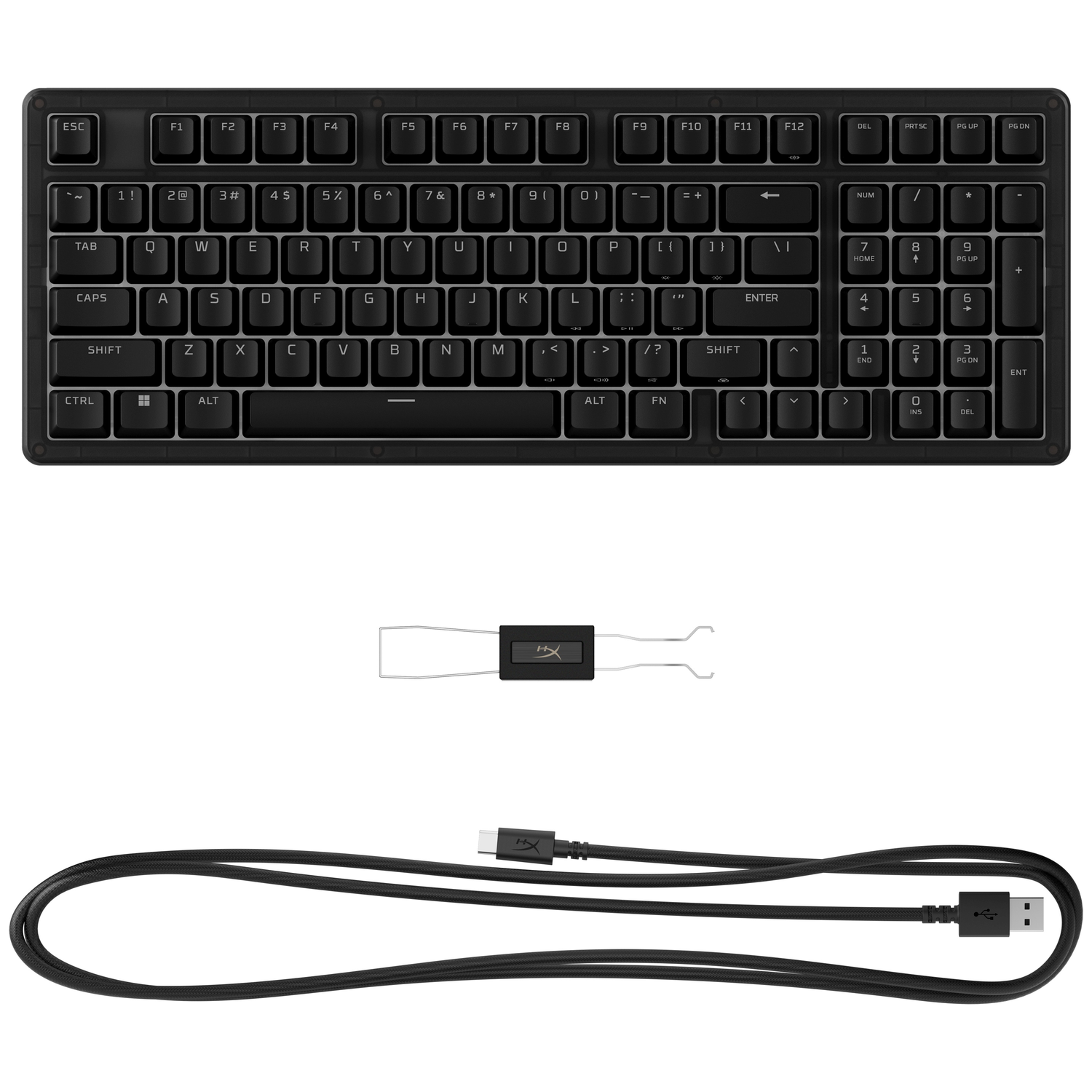 Black keyboard, keycap puller, and USB-C to USB-A cable.
