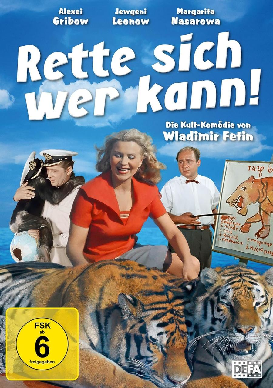 Filmplakat mit drei Personen, zwei Tigern und einem Affen, der eine Weltkugel hält.