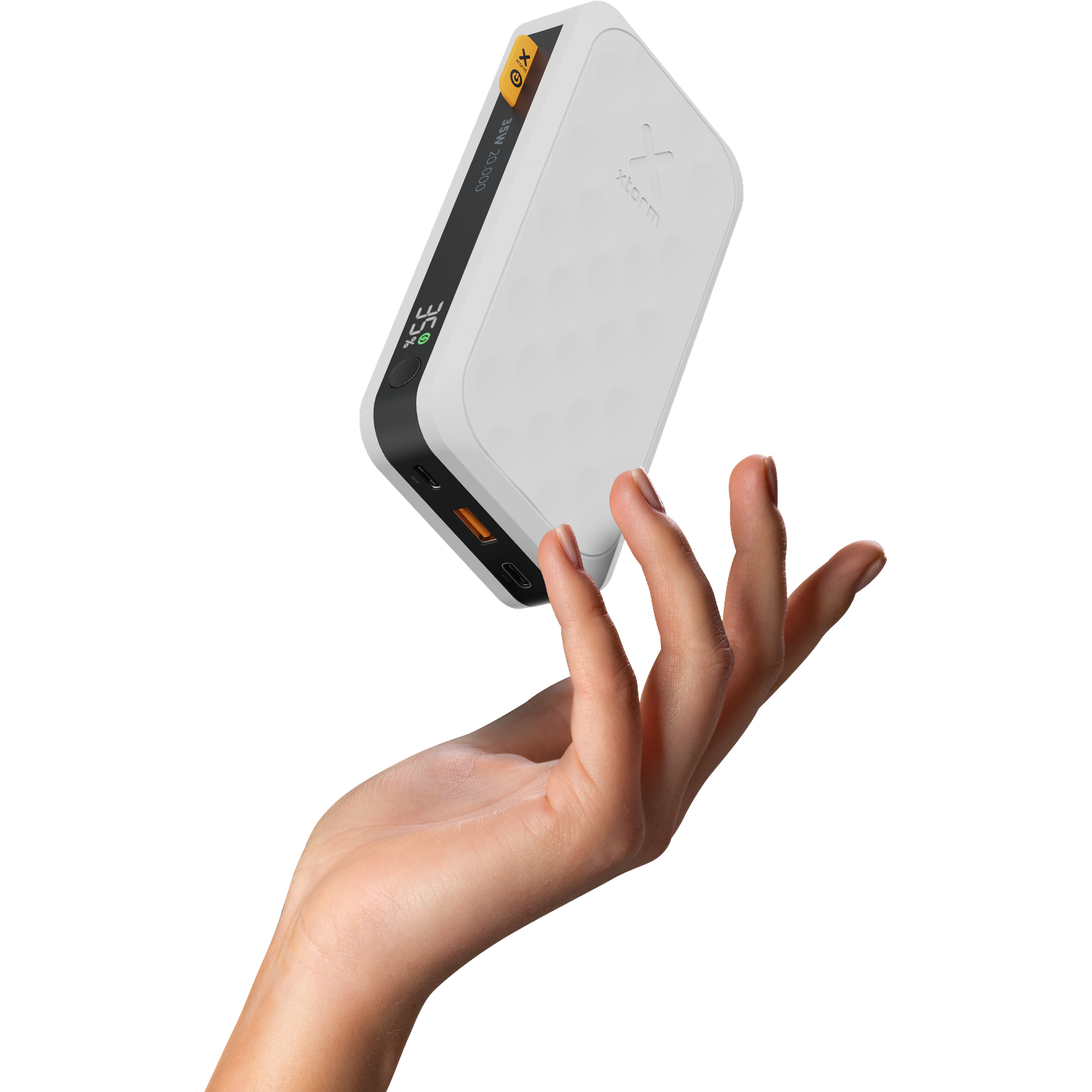 White power bank with hexagon pattern, held by a hand.
