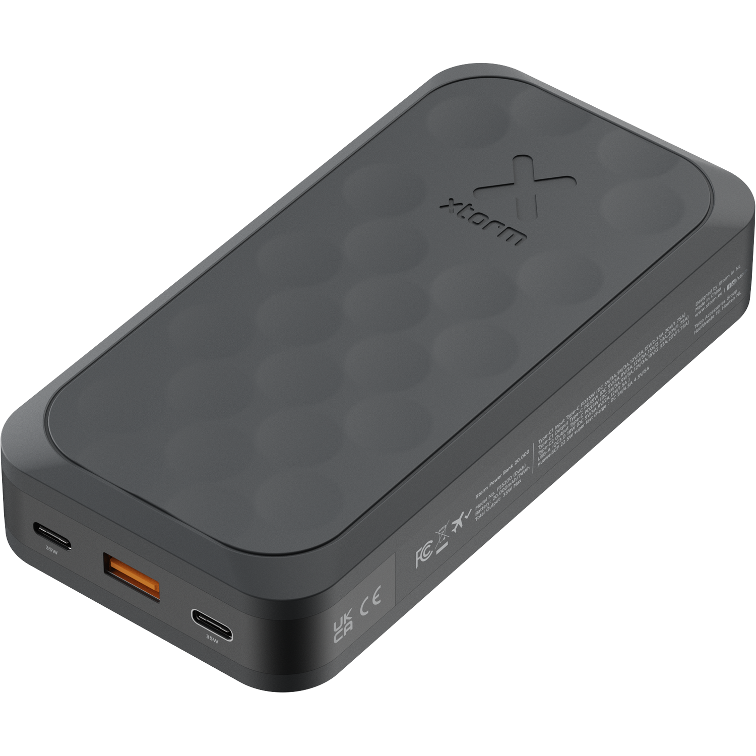 Dark grey Xtorm power bank with honeycomb pattern and USB-C/A ports.