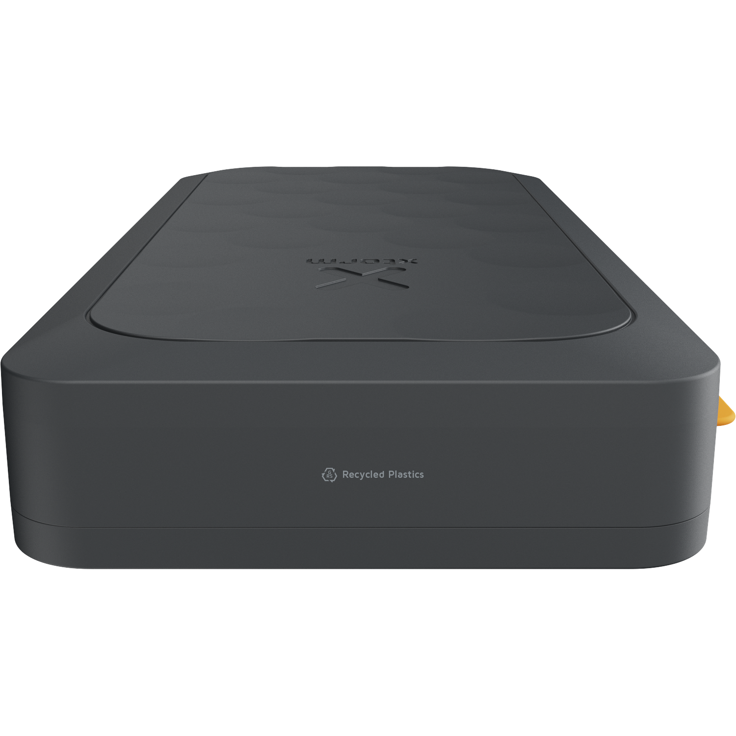 Dark gray rectangular device with embossed logo on top. Recycled plastics.
