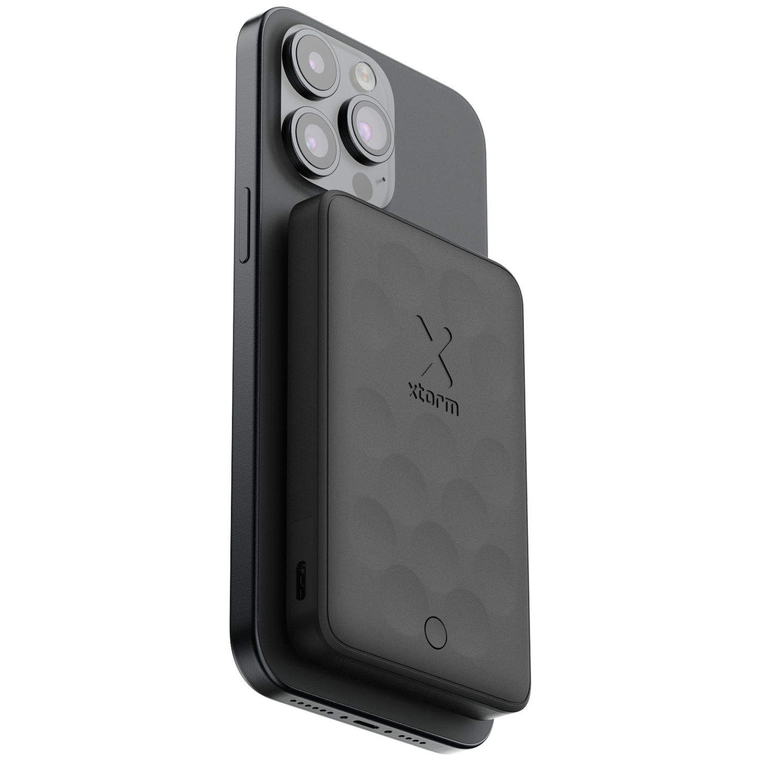 A black smartphone with an attached black power bank against a black background.