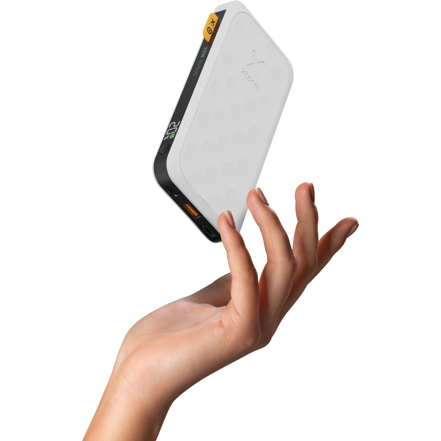 A hand holds a white power bank displaying 20% charge on its screen.