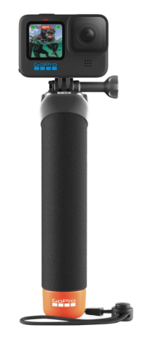 Czarny uchwyt GoPro z pomarańczową podstawą i nagrywającą kamerą.