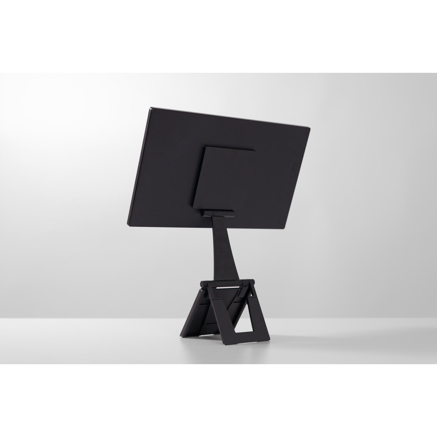 A black, upside-down screen on an adjustable stand.