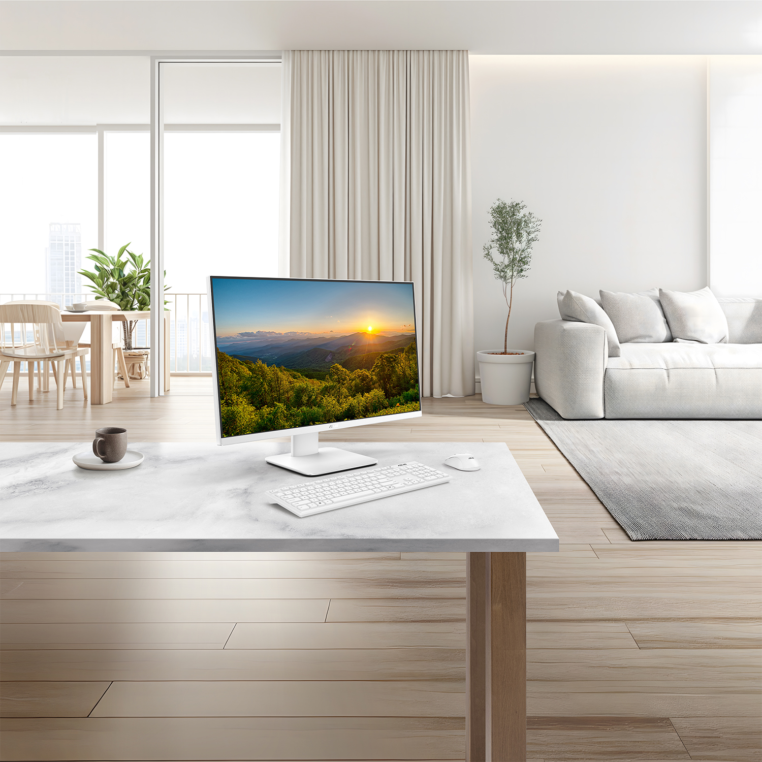 Un computer bianco su una scrivania di marmo, con un paesaggio sullo schermo.
