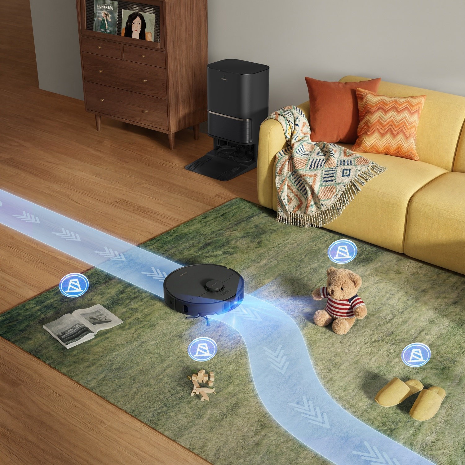 Un robot aspirapolvere pulisce un tappeto vicino a un divano con cuscini e coperta.
