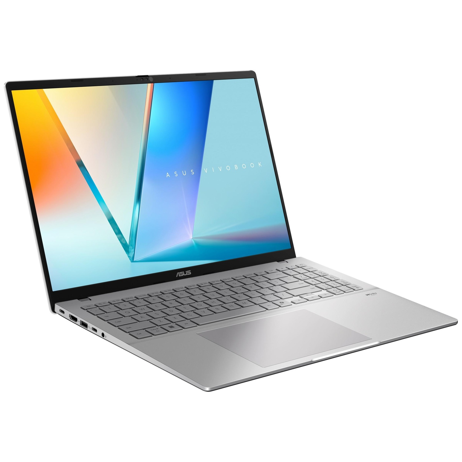 A silver Asus Vivobook laptop with a backlit keyboard and a colorful wallpaper.