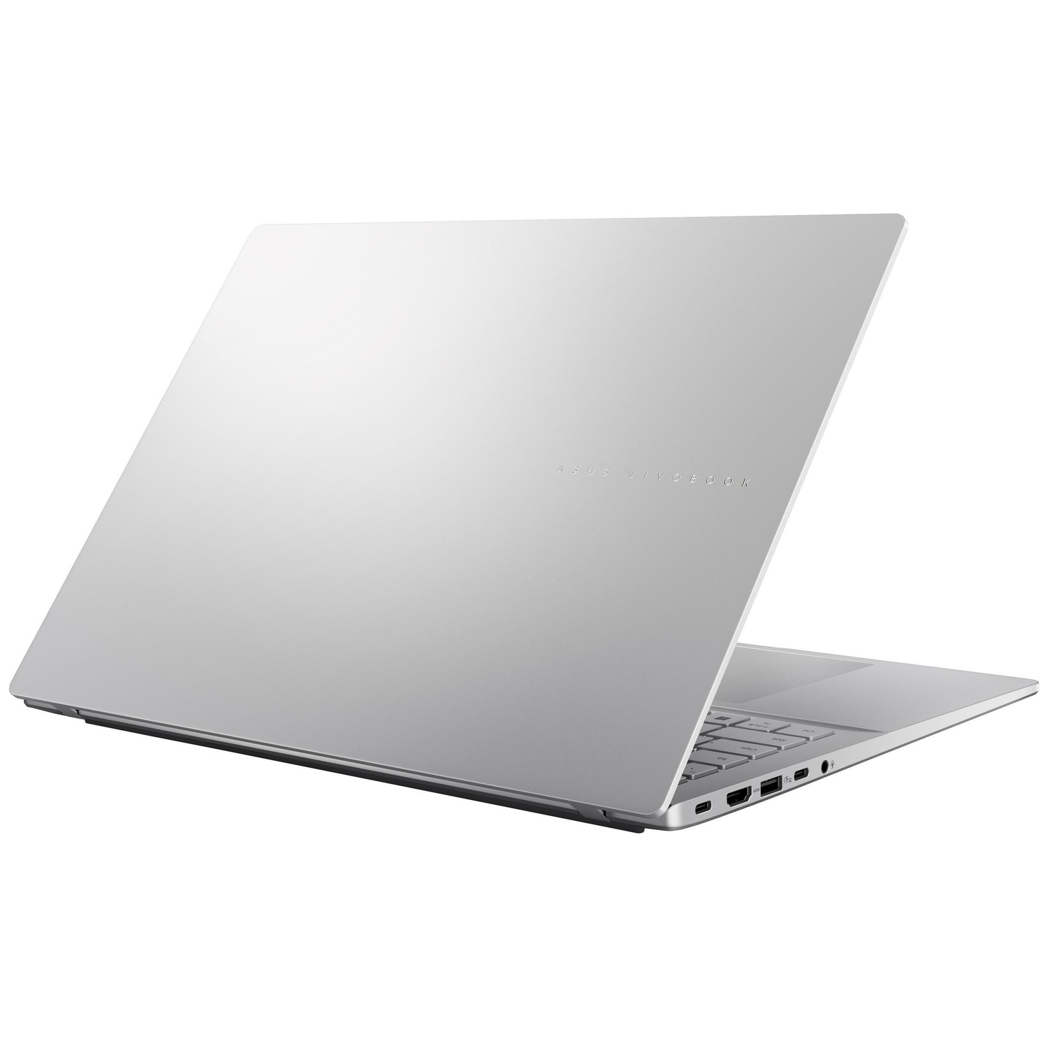A silver laptop with its lid open, showing ports on the side.