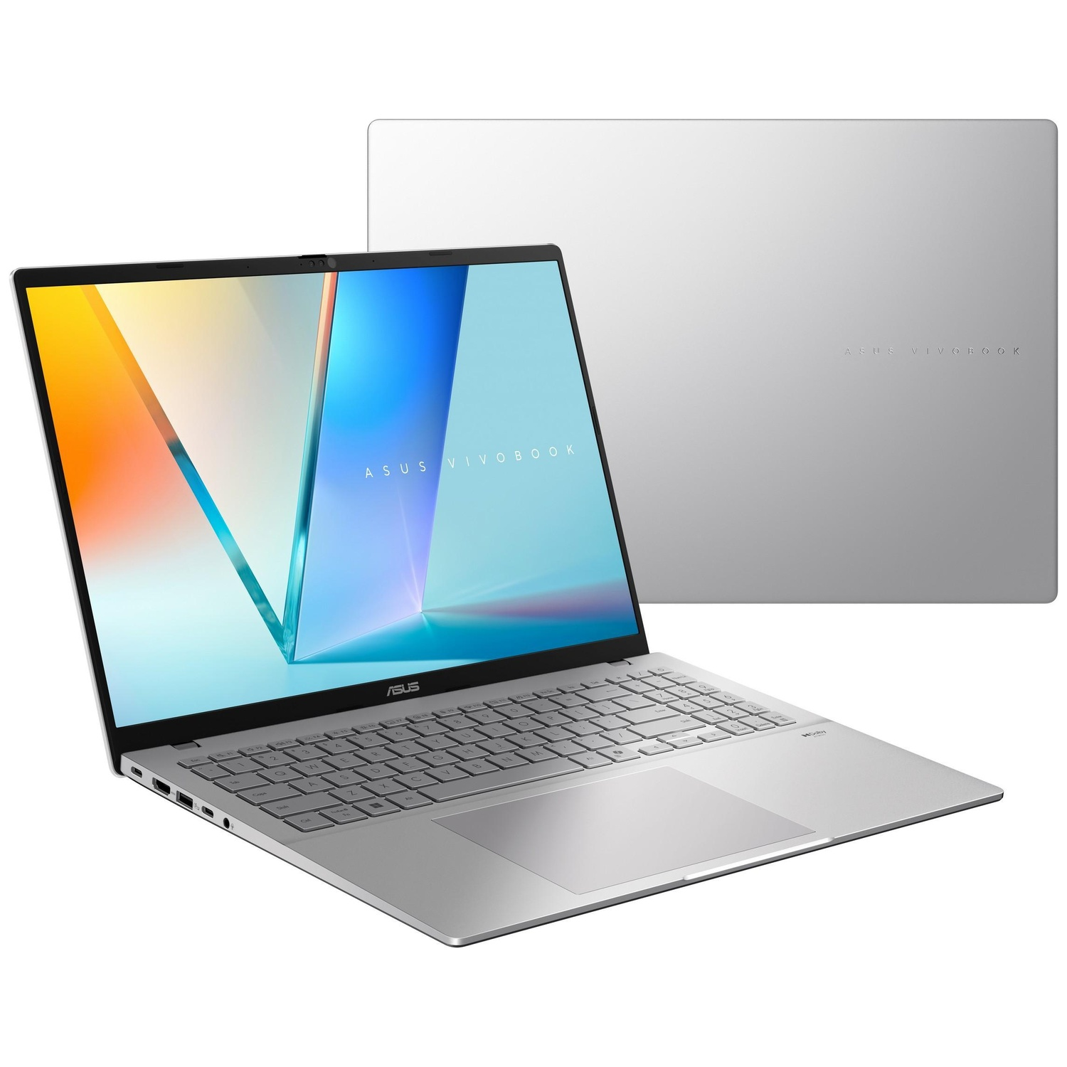 Silver Asus Vivobook laptop, open with a bright screen background.