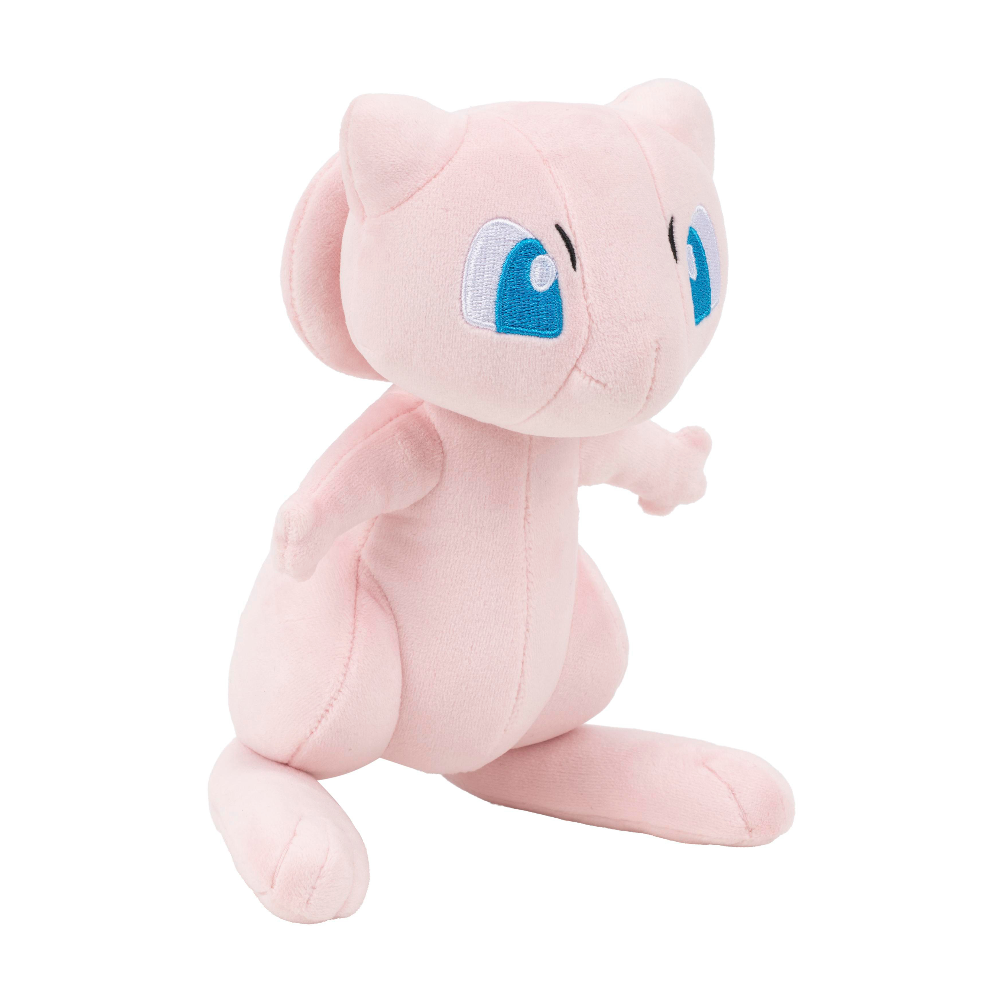 Ein rosa Plüschtier von Mew, mit blauen Augen und weißen Akzenten.