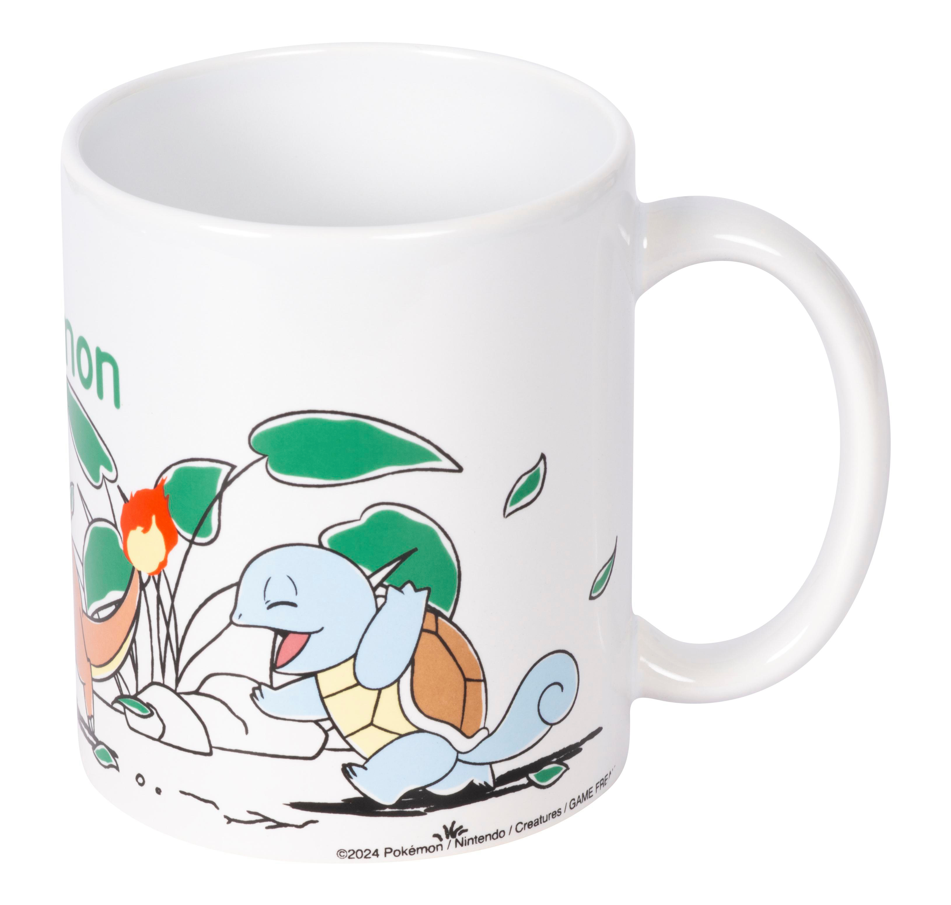 Weiße Tasse mit Pokémon-Motiv: Squirtle und Charmander mit grünen Blättern.