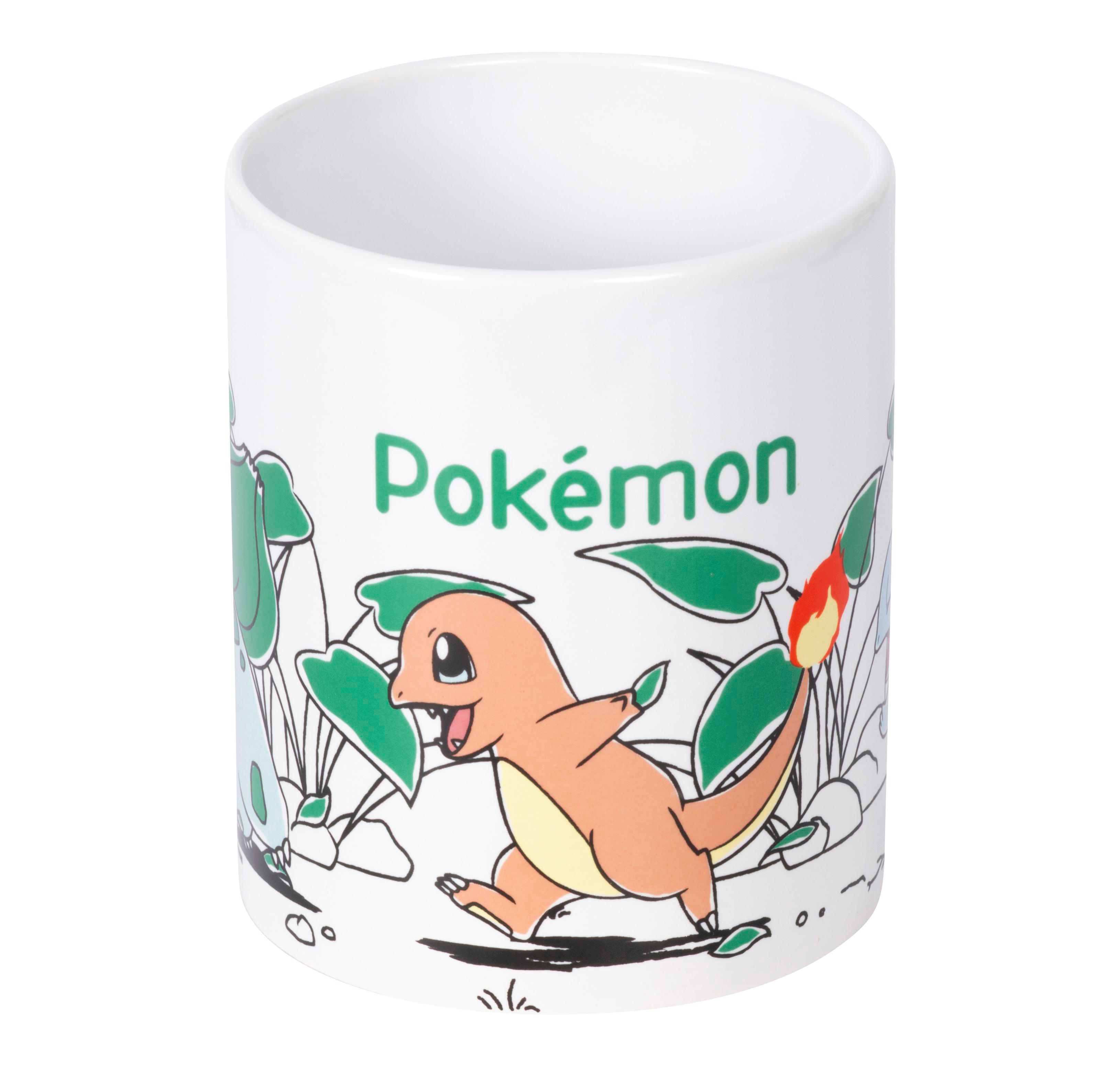 Weiße Tasse mit Pokémon-Motiv: Charmander und Bulbasaur mit grünen Blättern.