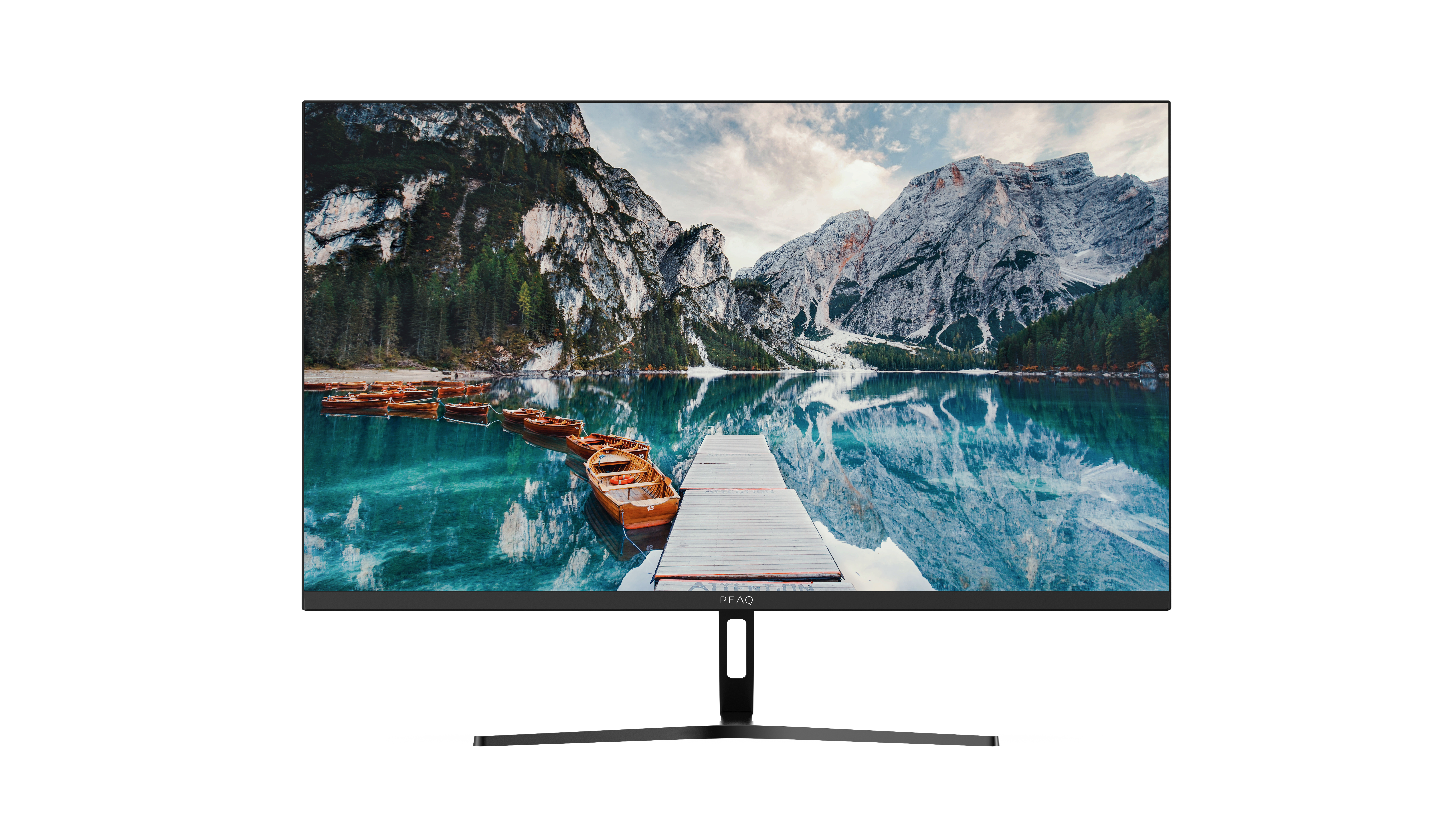 Drewniane łodzie unoszą się na turkusowym jeziorze przy molo, z górami w tle.