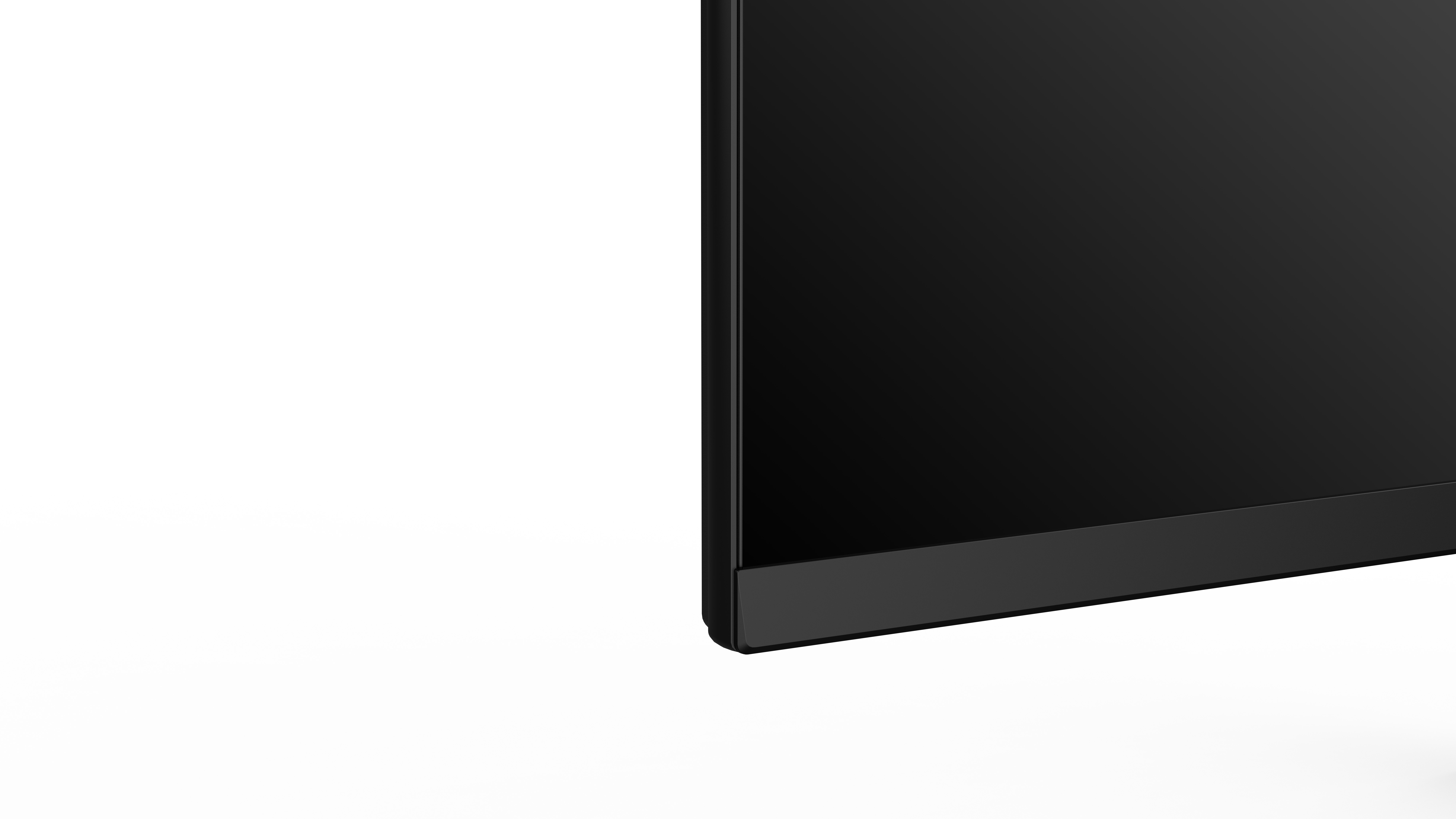 Czarna krawędź ekranu z wąskim ciemnym paskiem poniżej na białym tle.