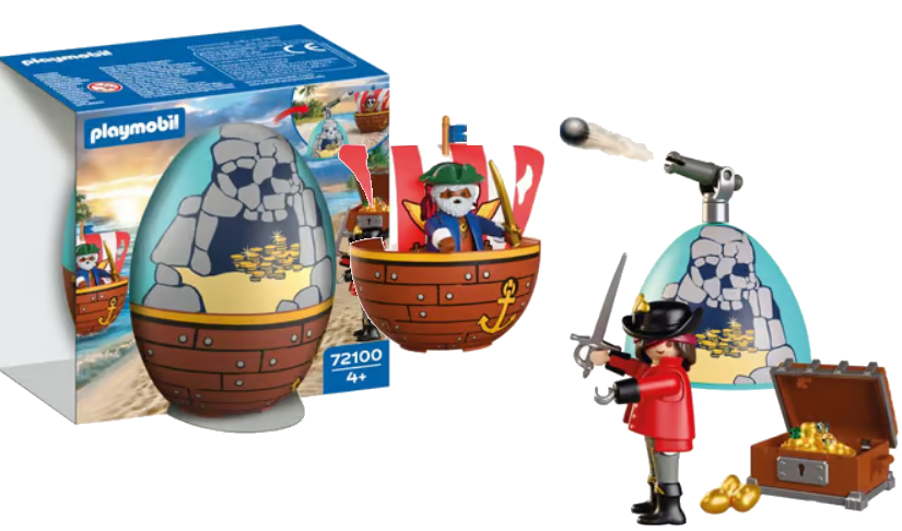 Piratenfiguren mit Schiff, Schatz und Kanone vor einer Eierverpackung.