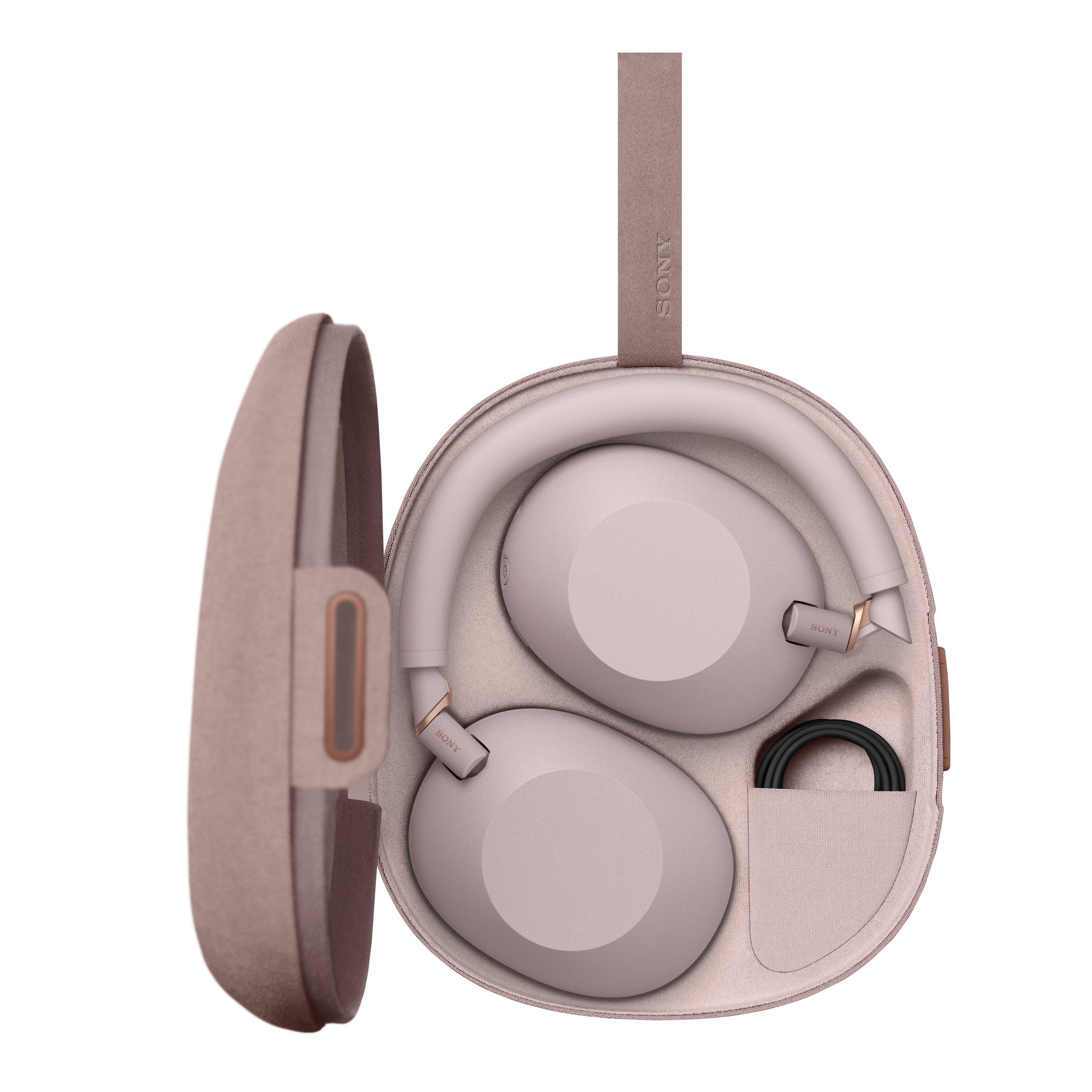 Jasnoróżowy zestaw słuchawkowy Sony z kablem ładującym w otwartym brązowym etui.