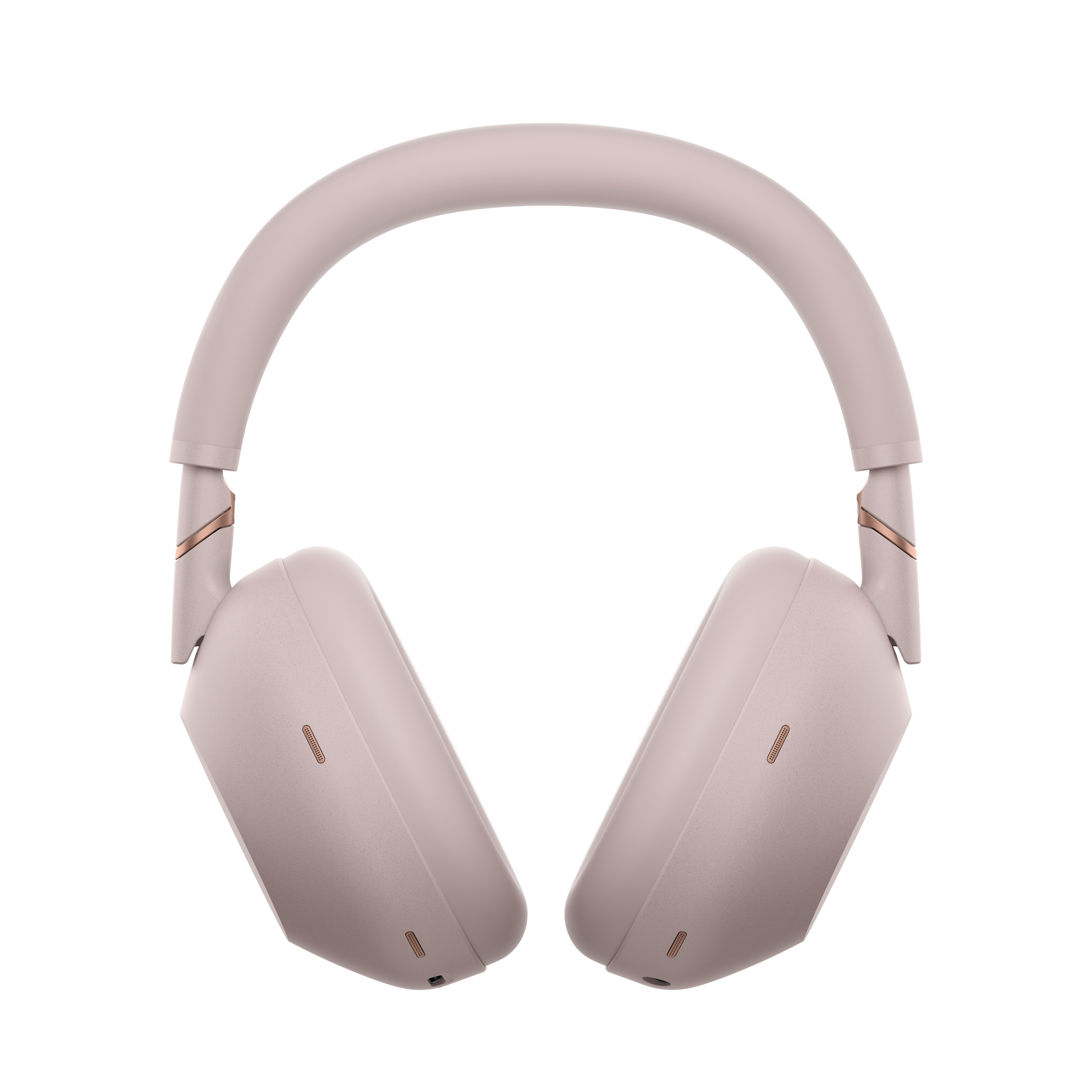Ein Paar hellrosa kabellose Over-Ear-Kopfhörer mit Roségold-Akzenten ist mittig vor einem weißen Hintergrund platziert.