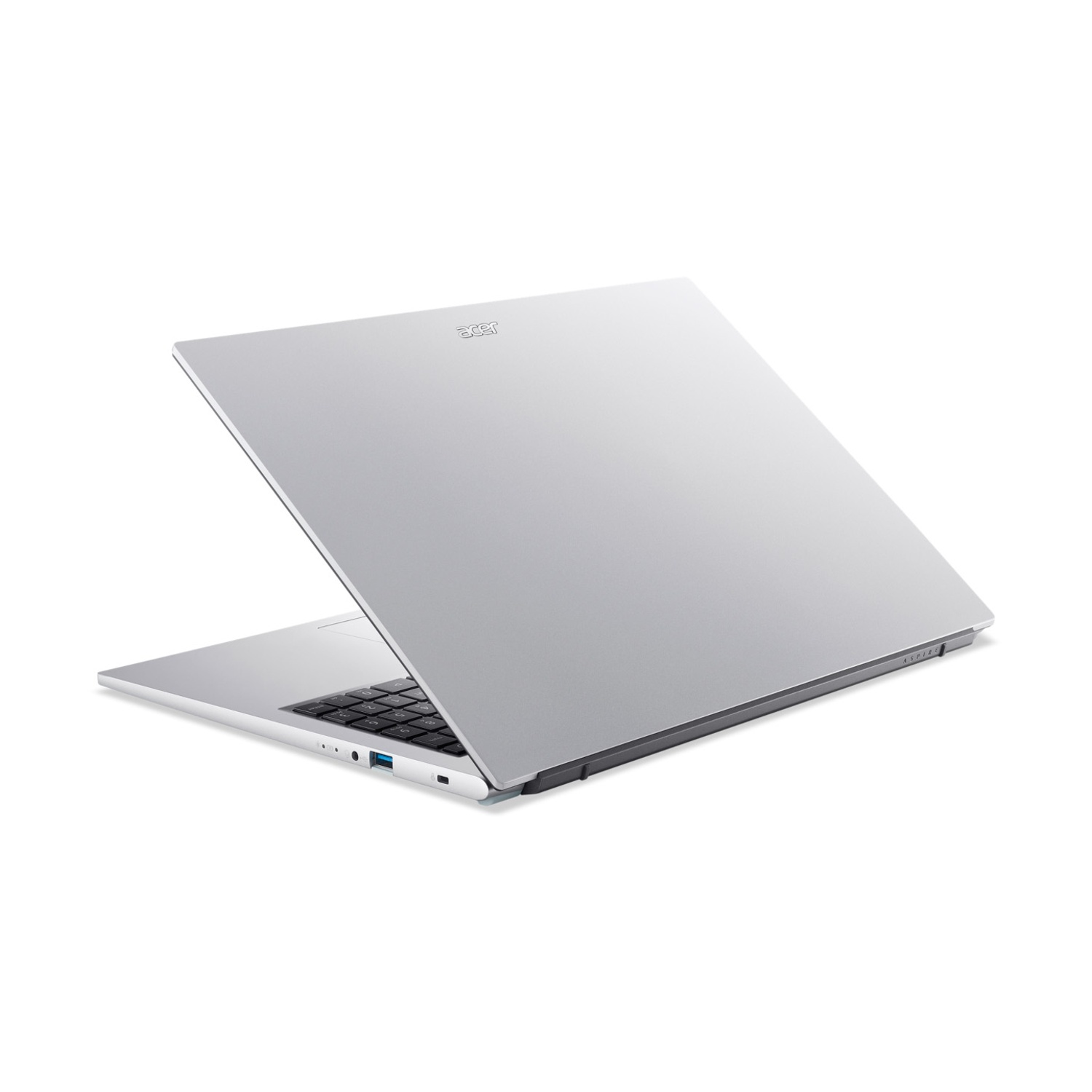 Laptop argento con coperchio aperto, tastiera e porte visibili.