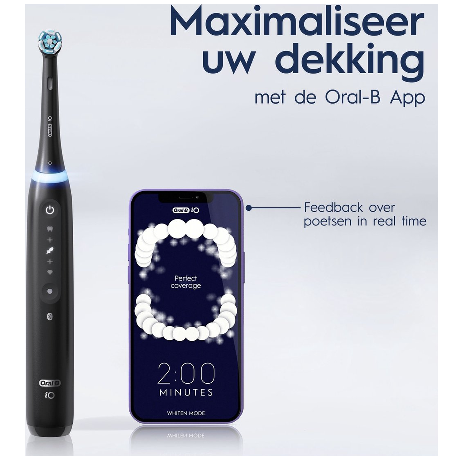 Black Oral-B iO toothbrush next to a smartphone displaying the Oral-B app.