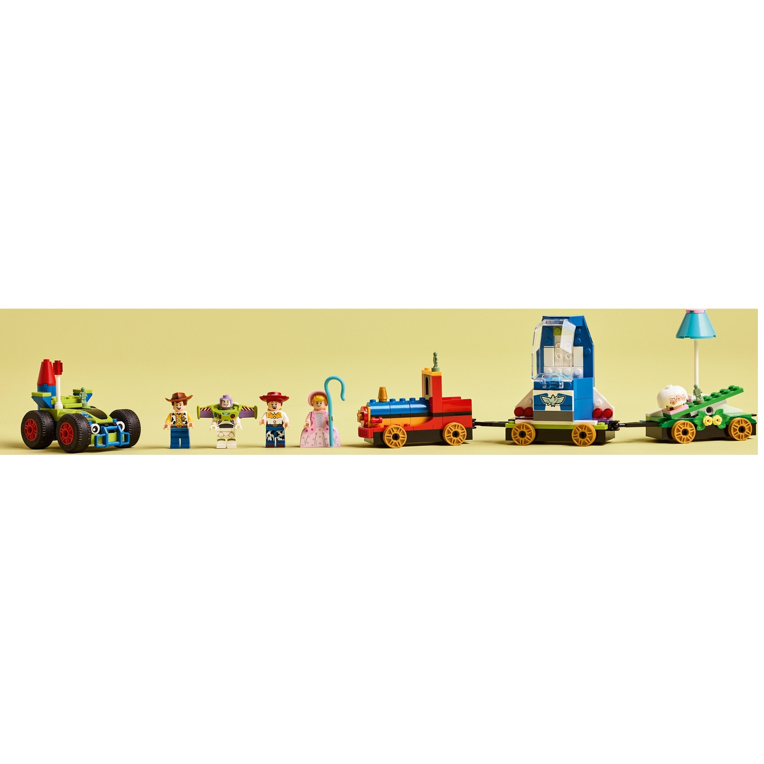 Train jouet Lego avec figurines : Woody, Buzz l'Éclair, Jessie, Bo Peep, et plus.