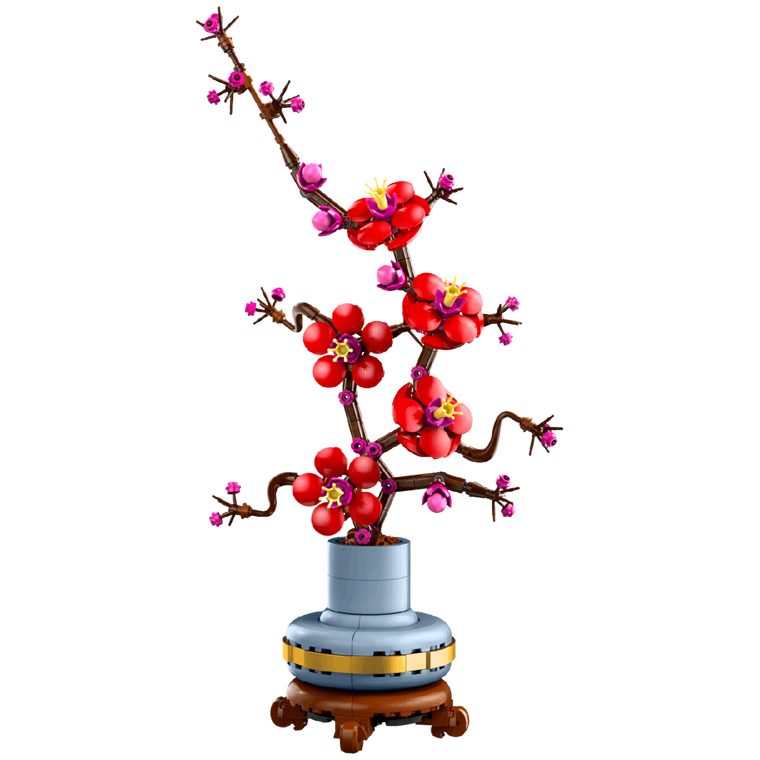 Een Lego-model van een bloeiende boom met rode en roze bloesems op bruine takken in een blauwe pot.