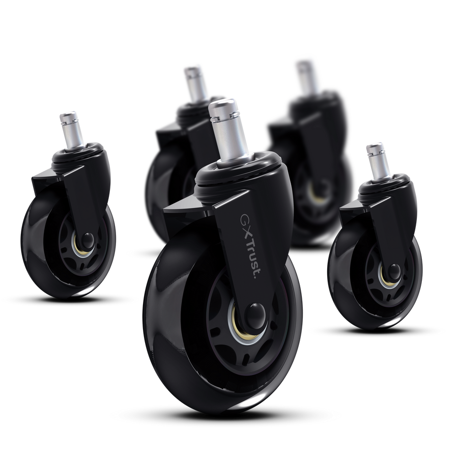 Cztery czarne kółka z srebrnymi trzpieniami na czarnym tle.