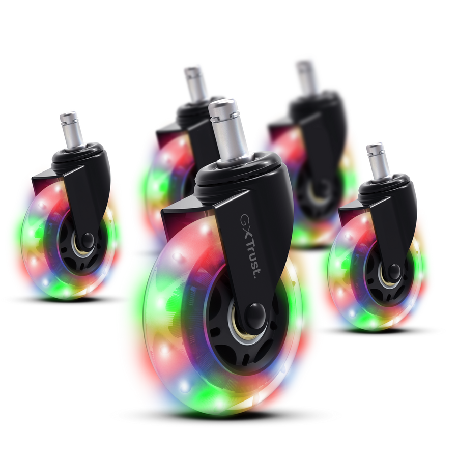 Pięć świecących kółek z kolorowymi światłami na czarnym tle.