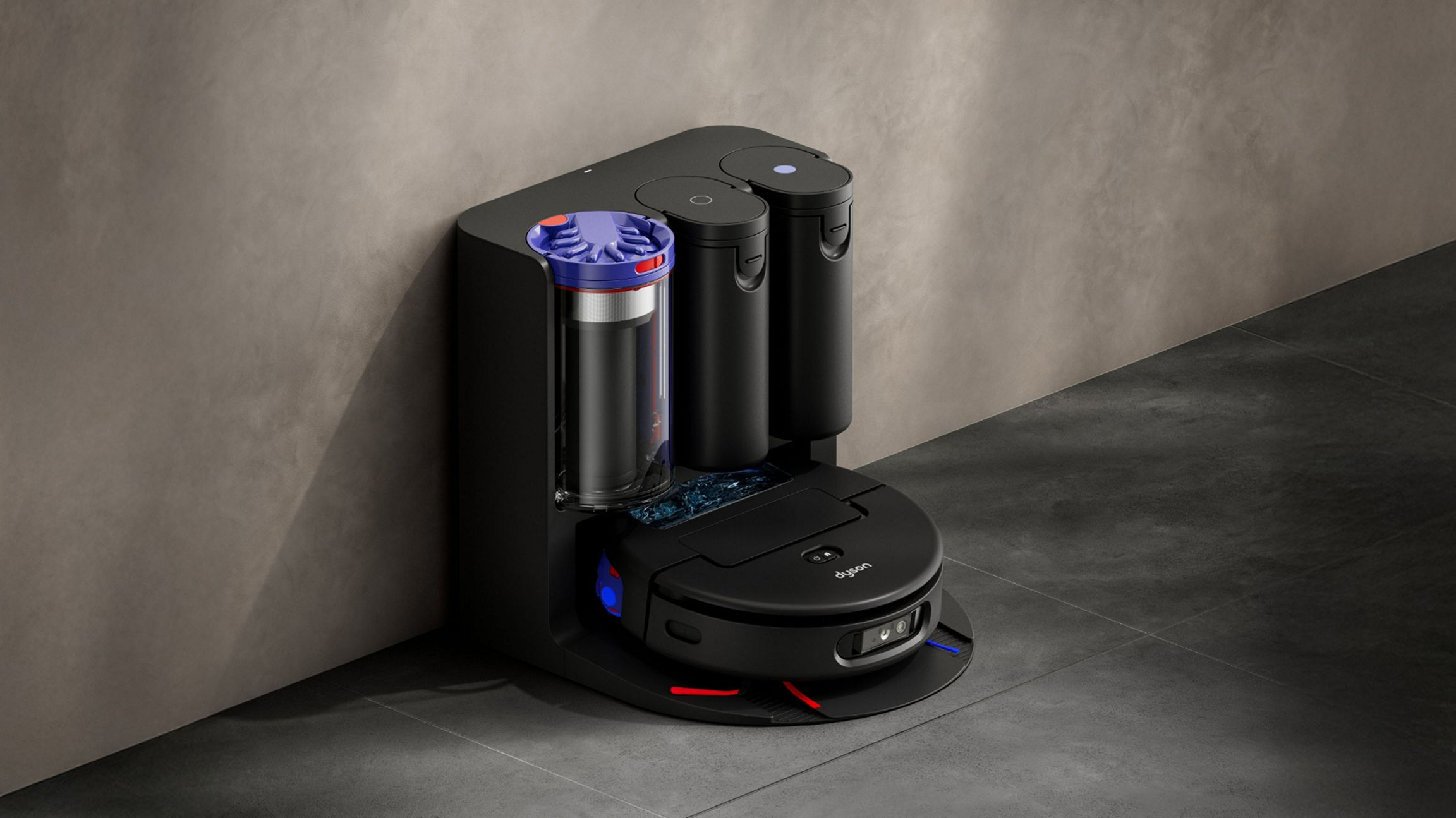 Aspirateur robot noir sur station de charge avec deux réservoirs.