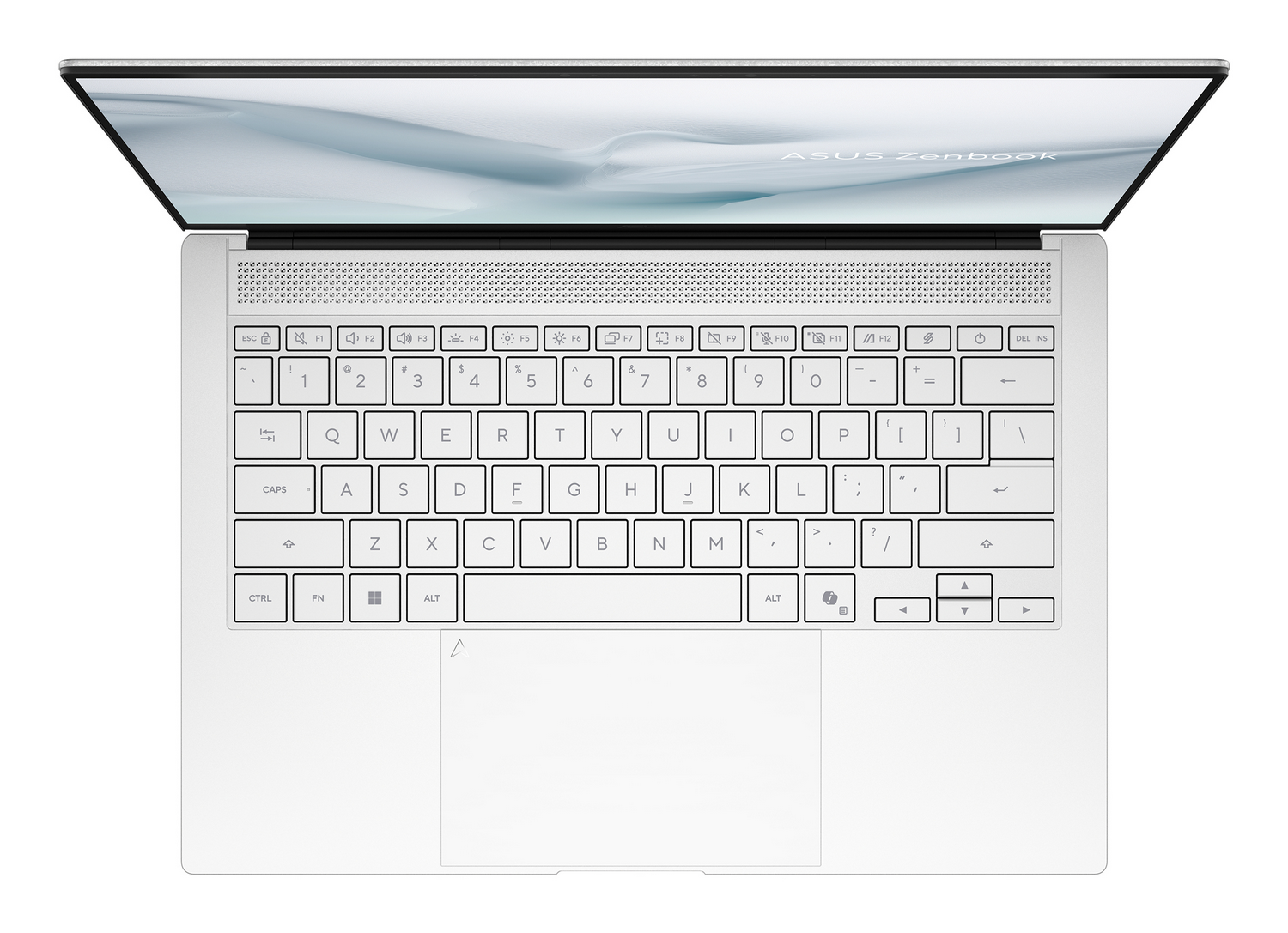 Un portátil plateado Asus Zenbook abierto visto desde arriba, con teclado retroiluminado.