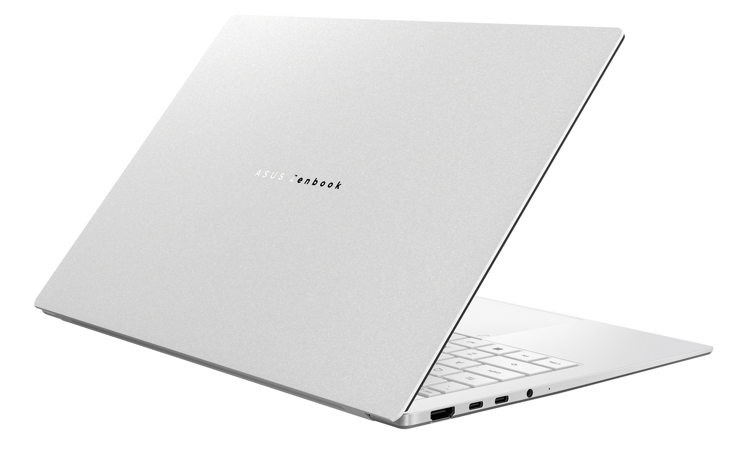 Un portátil plateado con la tapa abierta. Se ve el logo ASUS Zenbook en la tapa.