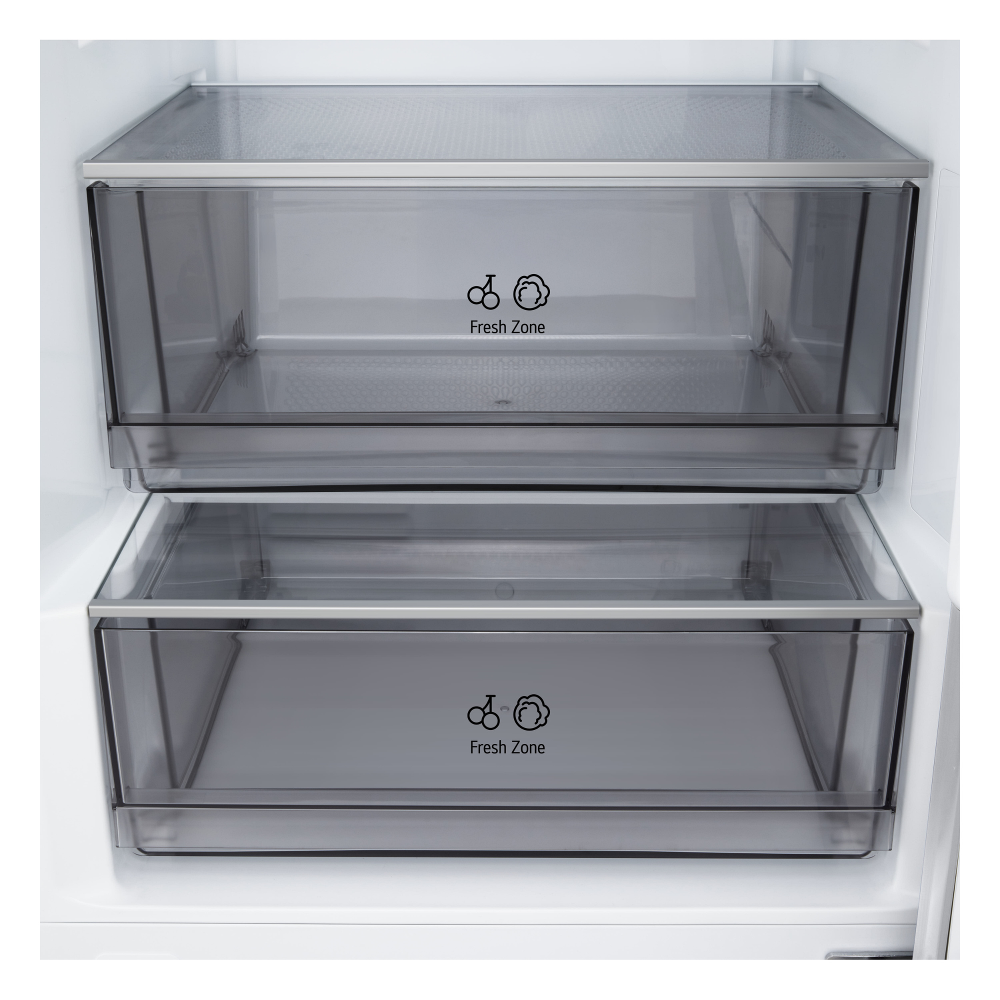 Dos cajones transparentes dentro de un refrigerador, etiquetados "Fresh Zone".