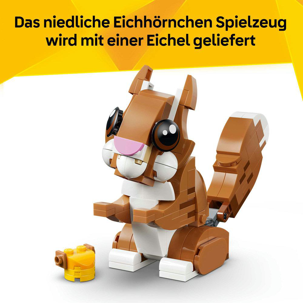 Ein braunes Lego-Eichhörnchen mit einer Eichel daneben.
