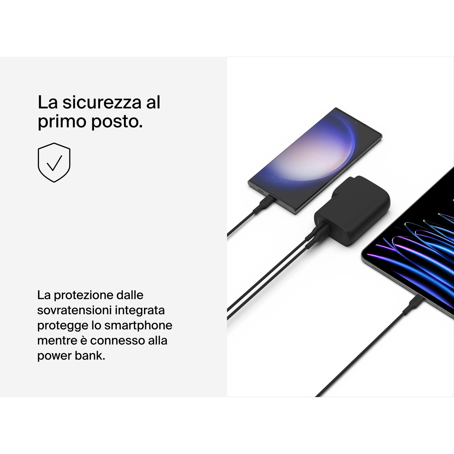 Un power bank nero carica due smartphone. Un'icona a scudo nelle vicinanze.