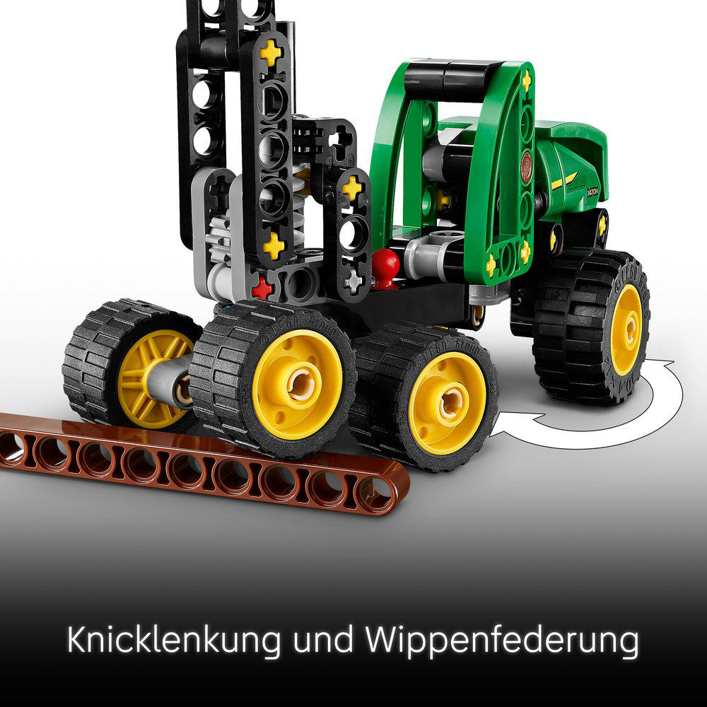 Ein grüner und grauer Spielzeug-LKW mit gelben Rädern.