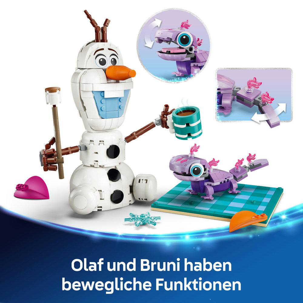 Olaf hält eine Tasse. Bruni, die Eidechse, ist lila und sitzt auf einer Platte.