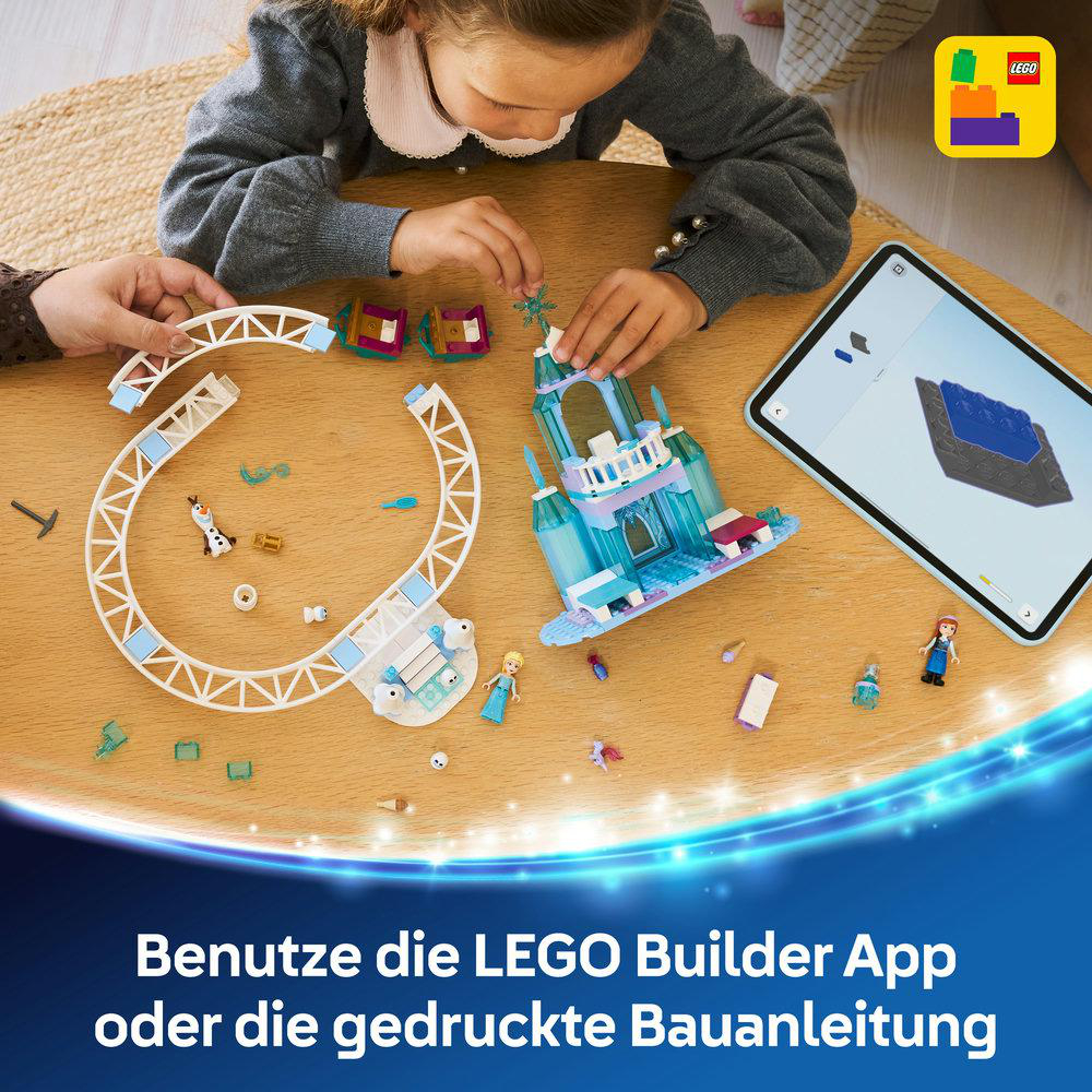 Kinder bauen ein Schloss mit LEGO-Steinen, Anleitung auf Tablet.